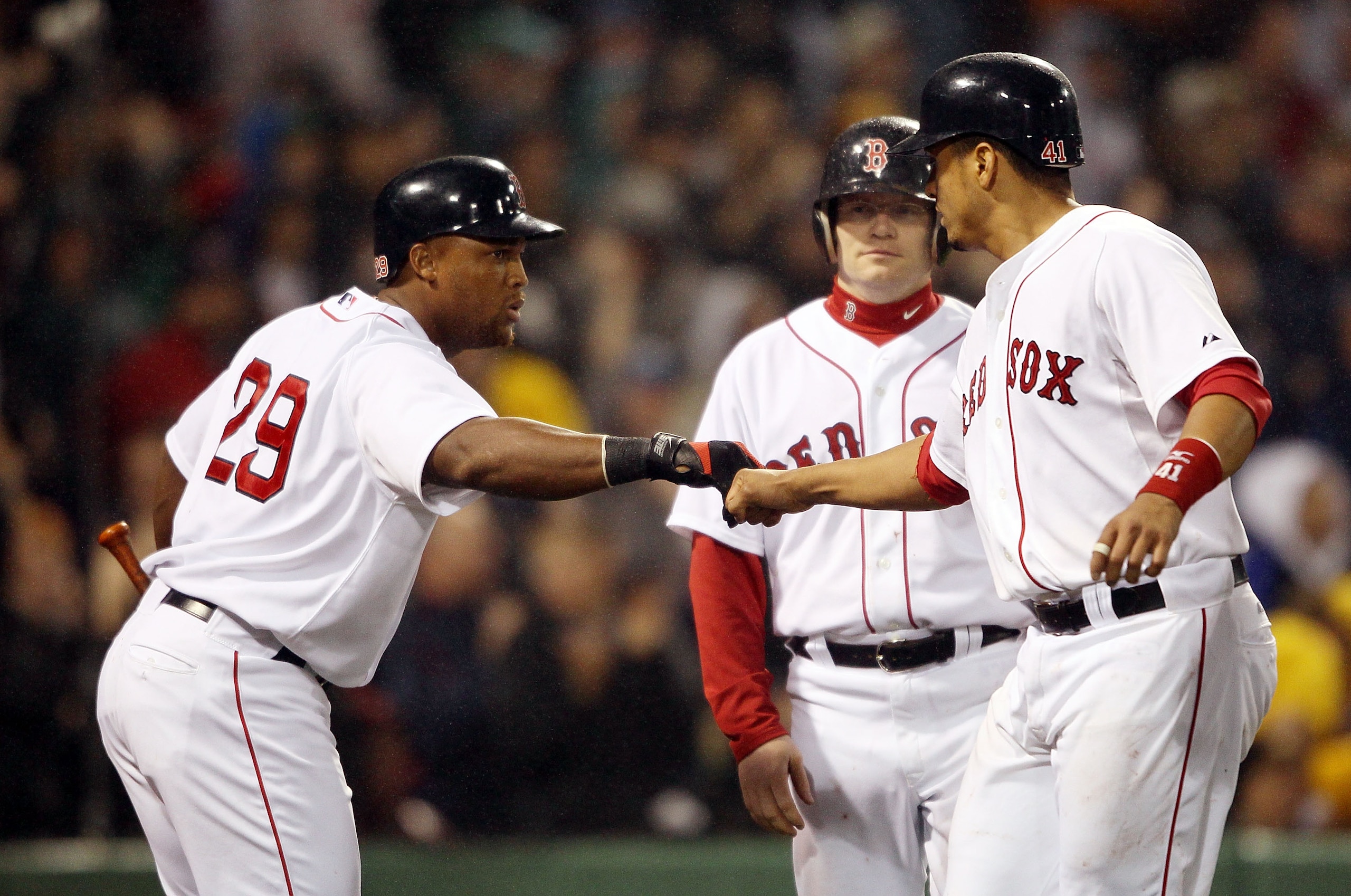 BOSTON - MAY 19: Adrian Beltre #29 of the Boston Red Sox congratulates teammate Victor Martinez #41 after Martinez scored in the fourth inning against the Minnesota Twins on May 19, 2010 at Fenway Park in Boston, Massachusetts. (Photo by Elsa/Getty Imag BOSTON - MAY 19: Adrian Beltre #29 of the Boston Red Sox congratulates teammate Victor Martinez #41 after Martinez scored in the fourth inning against the Minnesota Twins on May 19, 2010 at Fenway Park in Boston, Massachusetts. (Photo by Elsa/Getty Imag