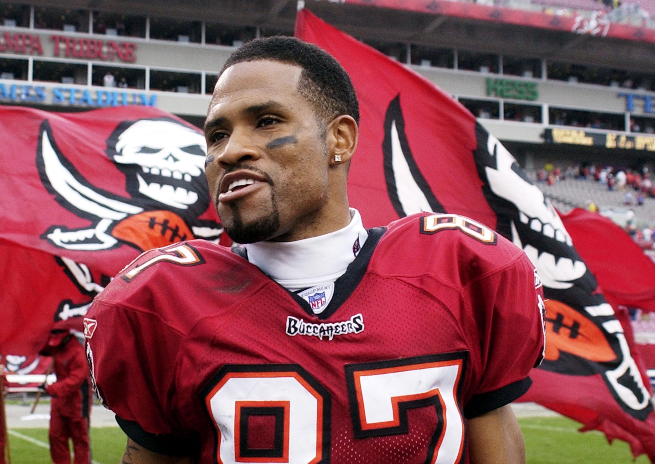 Tampa Bay Buccaneers wide receiver Keenan McCardell leaves the field after  play  against the Houston Texans at Raymond James Stadium, Tampa, Florida, December 14, 2003.  The Bucs defeated the Texans 16-0.  (Photo by Al Messerschmidt/Getty Images)