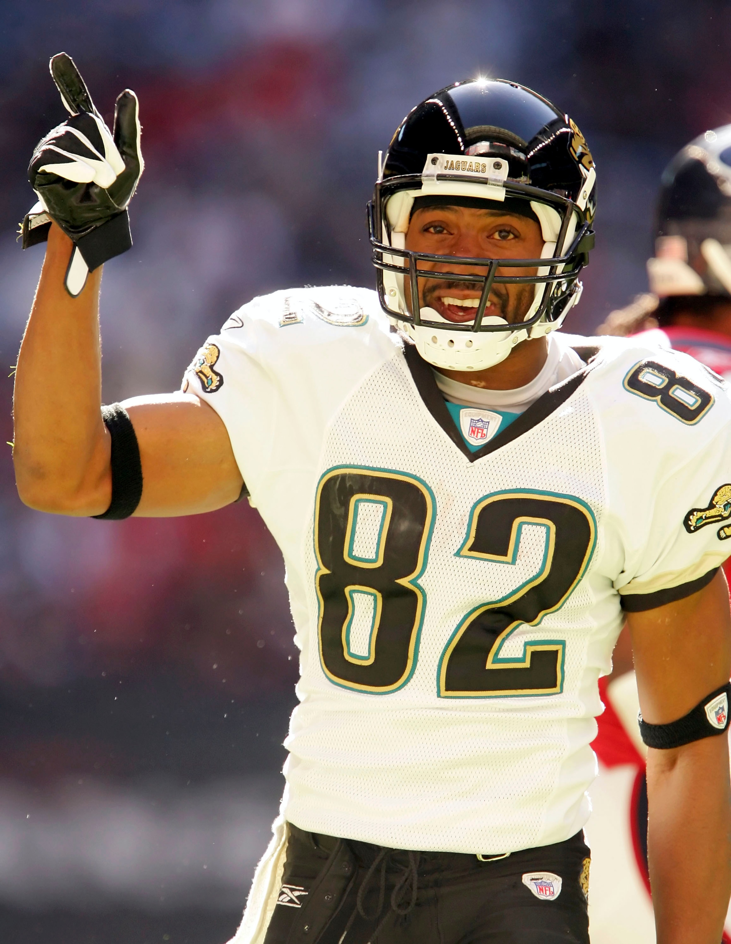 HOUSTON - DECEMBER 24:   Jimmy Smith #82 of the Jacksonville Jaguars celebrates during the game against the Houston Texans on December 24, 2005 at Reliant Stadium in Houston, Texas. The Jaguars won 38-20.  (Photo by Lisa Blumenfeld/Getty Images)