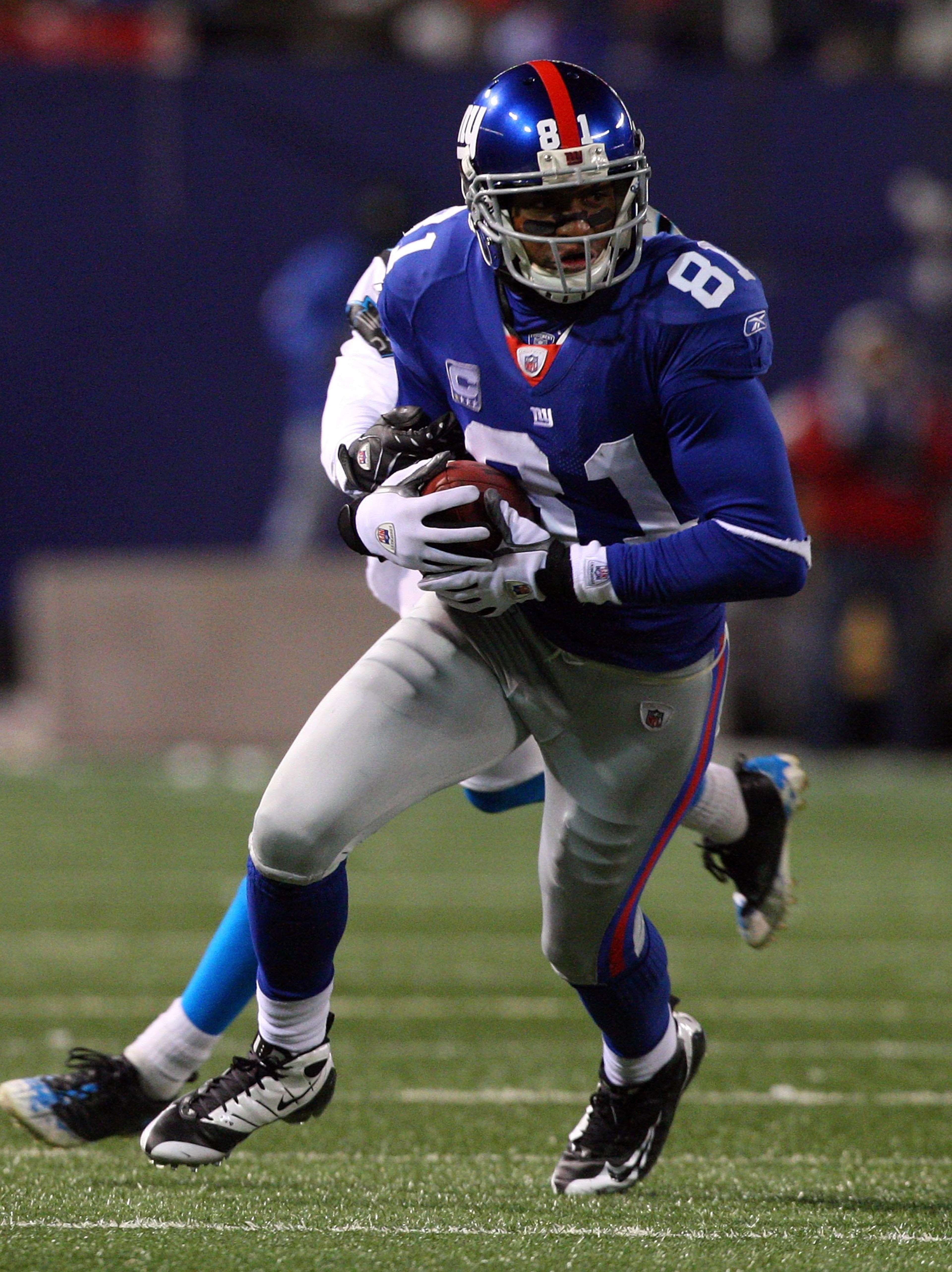EAST RUTHERFORD, NJ - DECEMBER 21: Amani Toomer #81 of the New York Giants runs the ball against the Carolina Panthers on December 21, 2008 at Giants Stadium in East Rutherford, New Jersey. (Photo by Jim McIsaac/Getty Images) EAST RUTHERFORD, NJ - DECEMBER 21: Amani Toomer #81 of the New York Giants runs the ball against the Carolina Panthers on December 21, 2008 at Giants Stadium in East Rutherford, New Jersey. (Photo by Jim McIsaac/Getty Images)