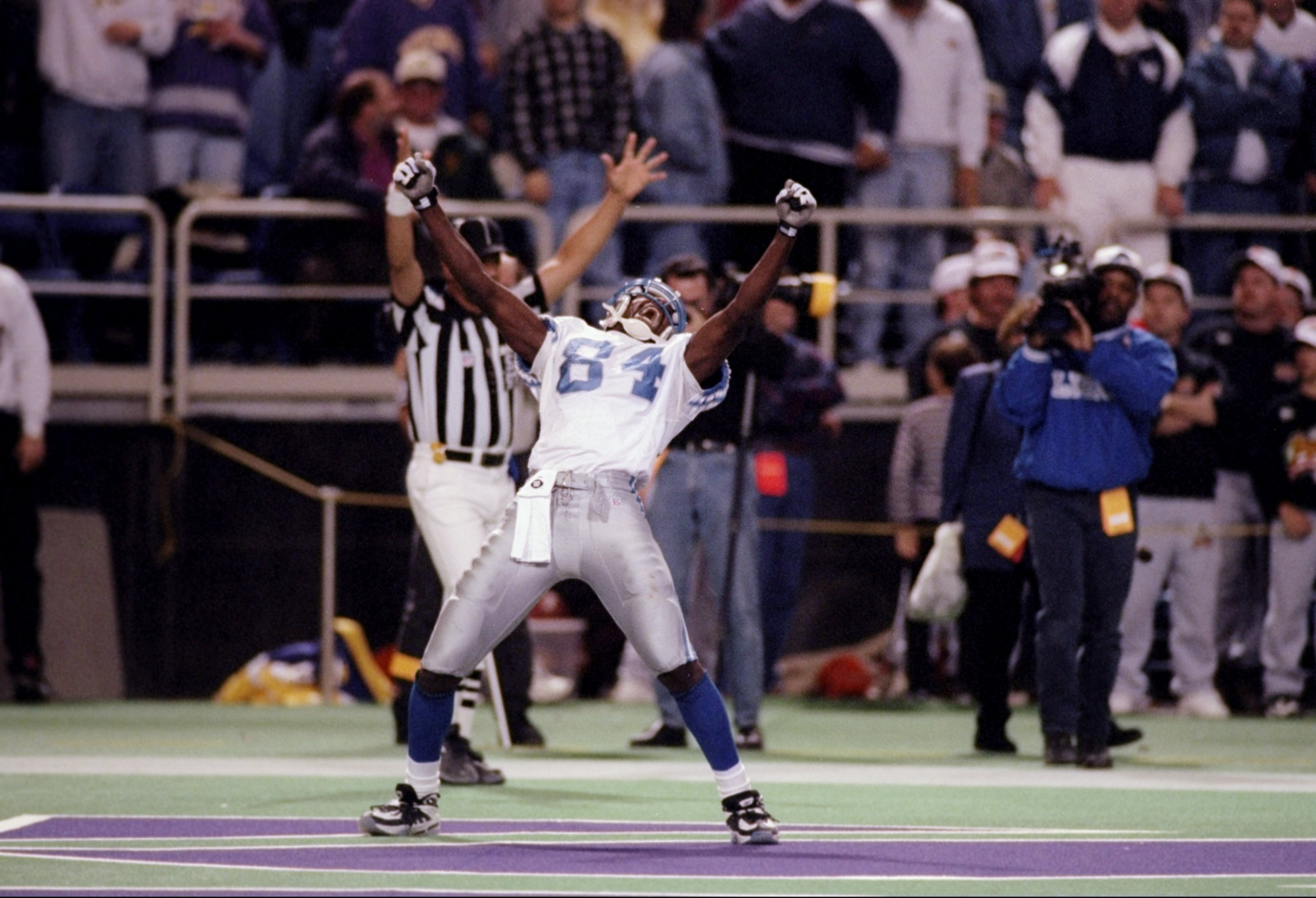 14 Dec 1997:  Wide receiver Herman Moore #84 of the Detroit Lions celebrates after catching the game winning touchdown during the Lions 14-13 win over the Minnesota Vikings at Hubert H. Humphrey Metrodome in Minneapolis, Minnesota. Mandatory Credit: Elsa