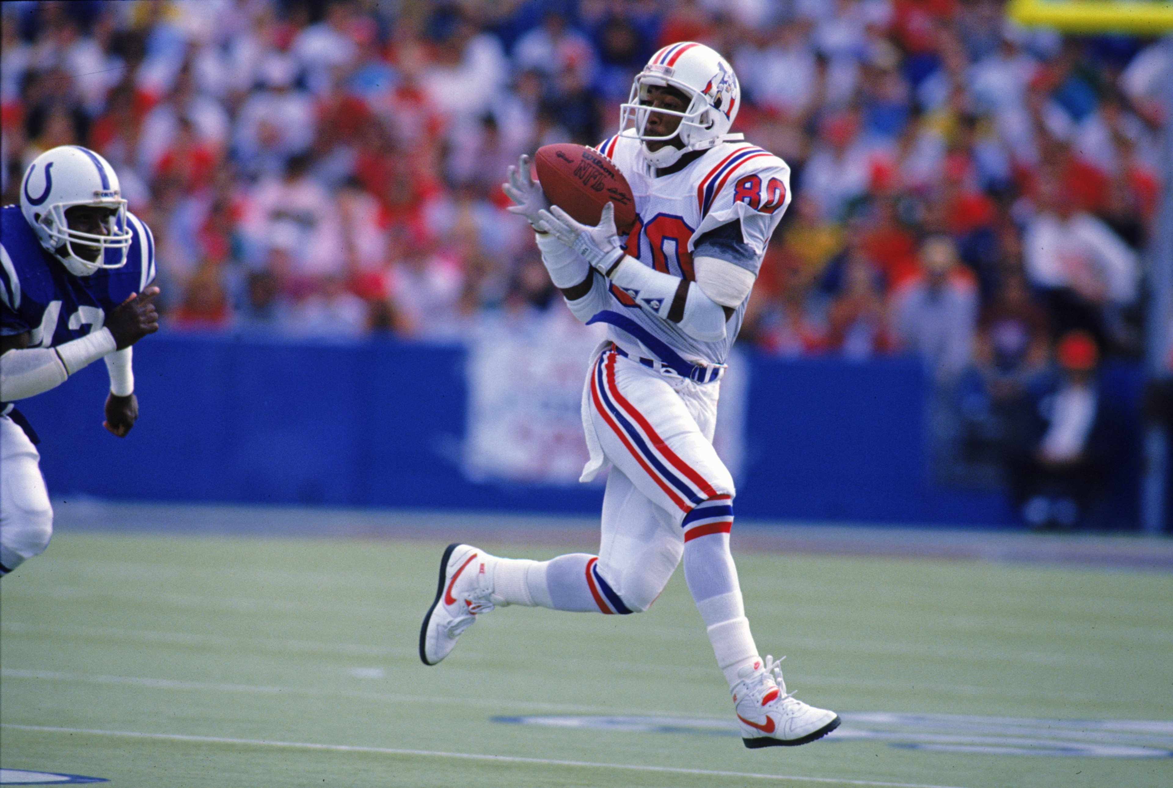 2 Oct 1988: Irving Fryar #80 of the New England Patriots catches the ball during the game against the Indianapolis Colts. The Patriots defeated the Clots 21-17. Mandatory Credit: Rick Stewart /Allsport 2 Oct 1988: Irving Fryar #80 of the New England Patriots catches the ball during the game against the Indianapolis Colts. The Patriots defeated the Clots 21-17. Mandatory Credit: Rick Stewart /Allsport