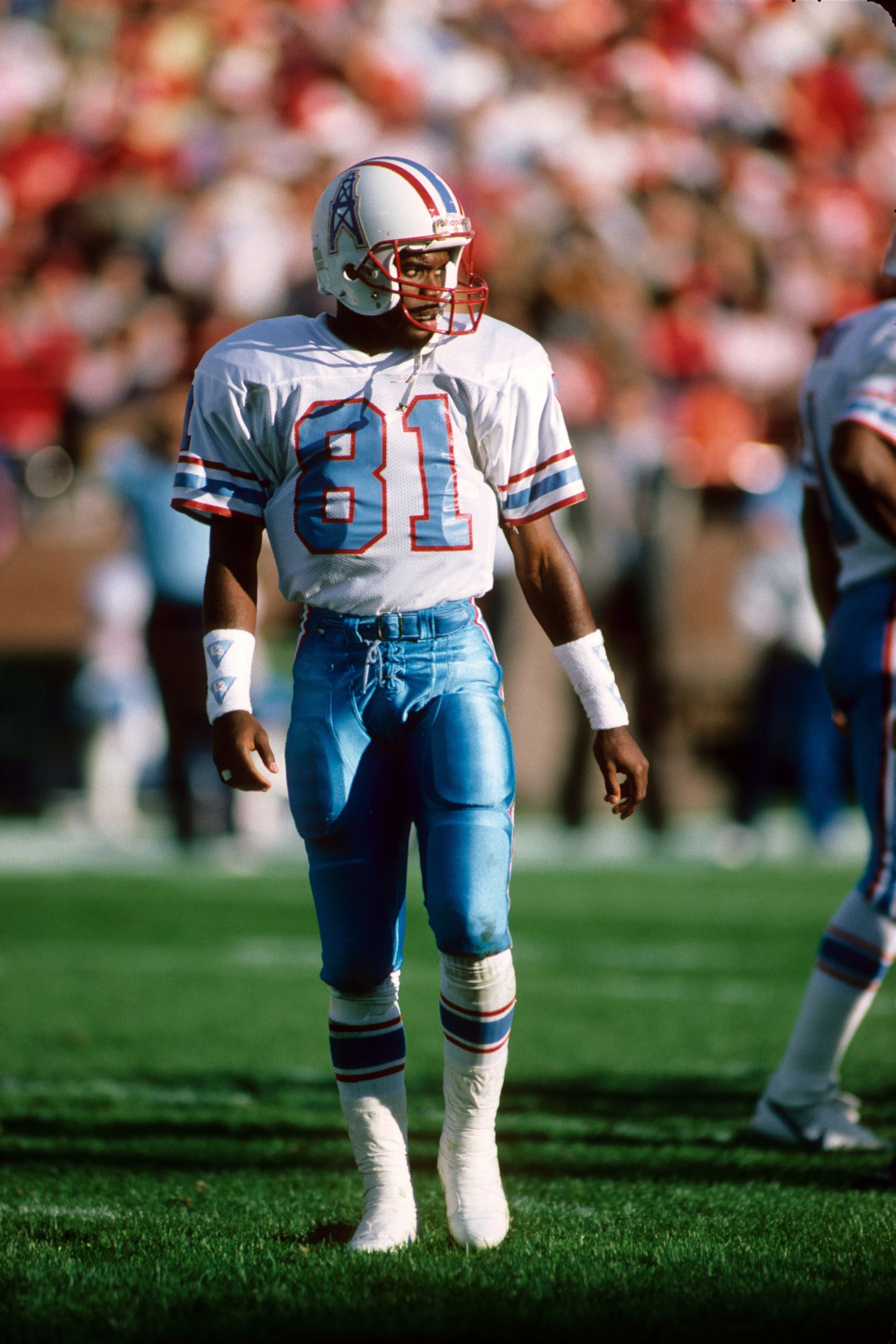SAN FRANCISCO - NOVEMBER 8:  Wide receiver Ernest Givens #81 of the Houston Oilers walks across the field during a game against the San Francisco 49ers at Candlestick Park on November 8, 1987 in San Francisco, California.  The 49ers won 27-20.  (Photo by