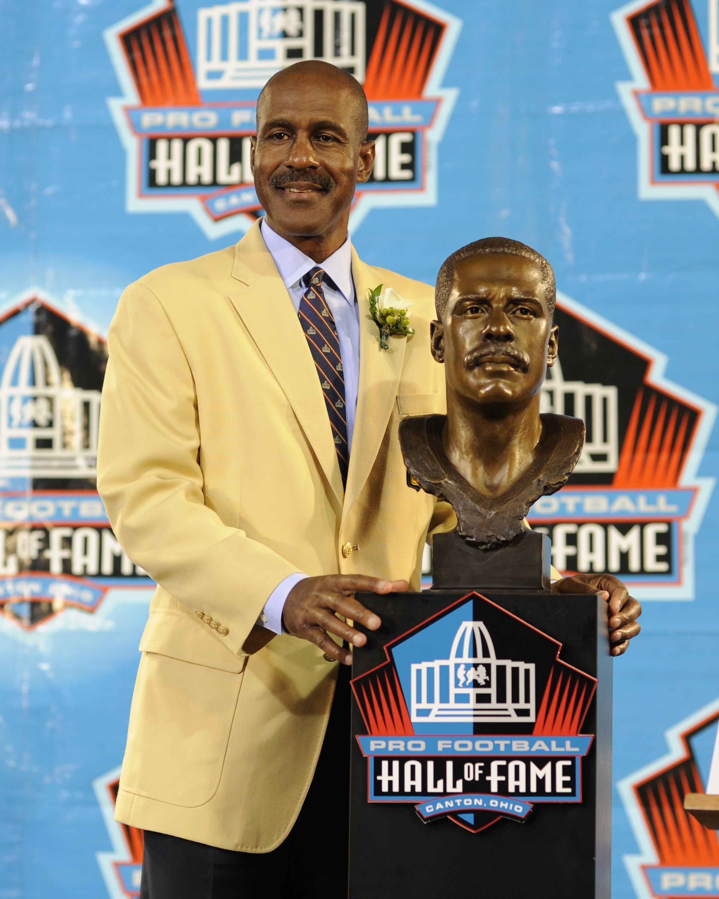 CANTON, OH - AUGUST 2: Art Monk of the Washington Redskins,  poses with his bust during the Class of 2008 Pro Football Hall of Fame Enshrinement Ceremony at Fawcett Stadium on August 2, 2008 in Canton, Ohio.   (Photo by Al Messerschmidt/Getty Images)