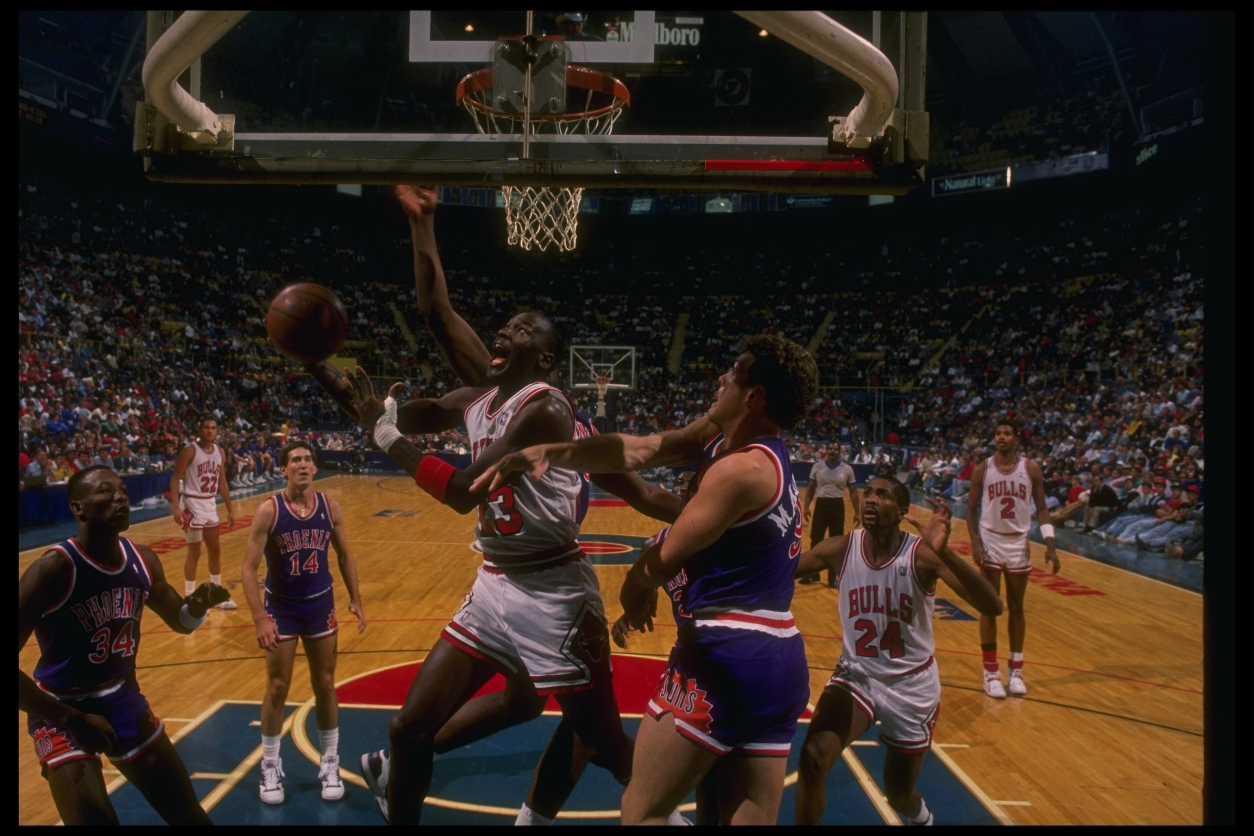 Guard Michael Jordan of the Chicago Bulls (center).