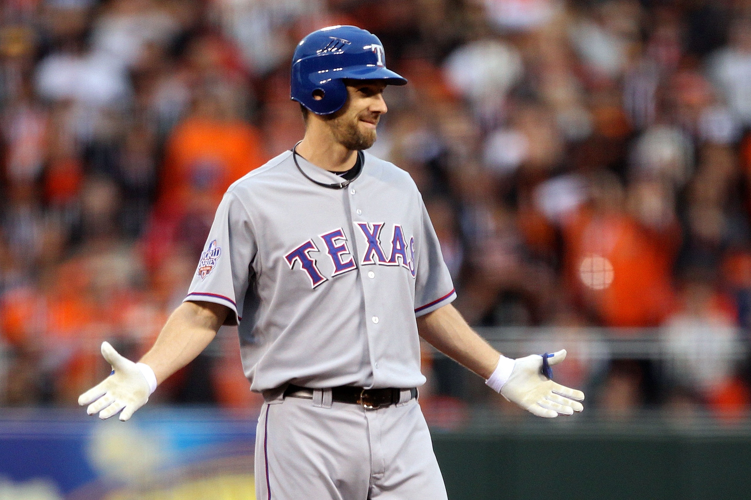 SAN FRANCISCO - OCTOBER 27:  Cliff Lee #33 of the Texas Rangers reacts after hitting a double in the second against the San Francisco Giants in Game One of the 2010 MLB World Series at AT&T Park on October 27, 2010 in San Francisco, California.  (Photo by