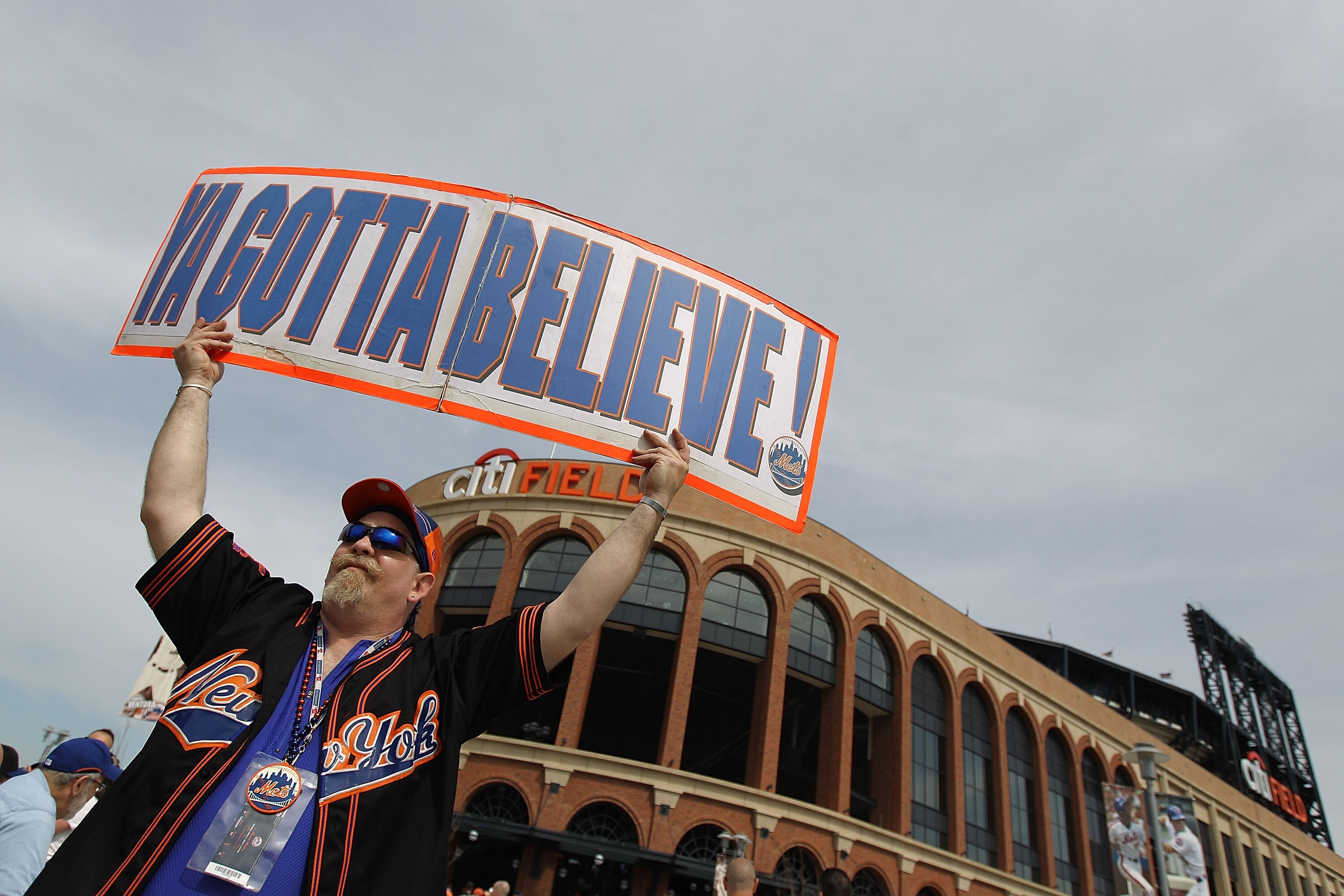 NEW YORK - APRIL 05:  Fans outside the stadium prior to the Opening Day Game between the New York Mets and the Florida Marlins at Citi Field on April 5, 2010 in the Flushing neighborhood of the Queens borough of New York City.  (Photo by Nick Laham/Getty 
