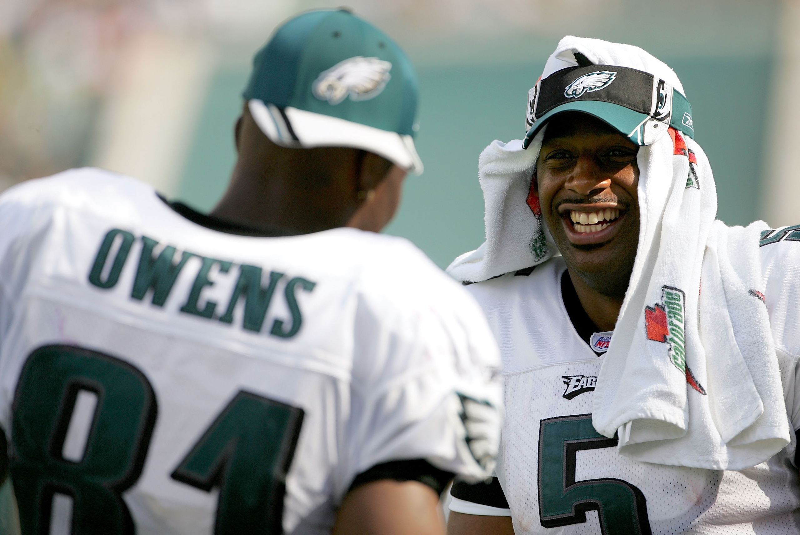 PHILADELPHIA - SEPTEMBER 18: Quarterback Donovan McNabb #5 of the Philadelphia Eagles jokes with teammate receiver Terrell Owens #81 while on the sidelines during the second half of the game against the San Francisco 49ers on September 18, 2005 at Lincol PHILADELPHIA - SEPTEMBER 18: Quarterback Donovan McNabb #5 of the Philadelphia Eagles jokes with teammate receiver Terrell Owens #81 while on the sidelines during the second half of the game against the San Francisco 49ers on September 18, 2005 at Lincol