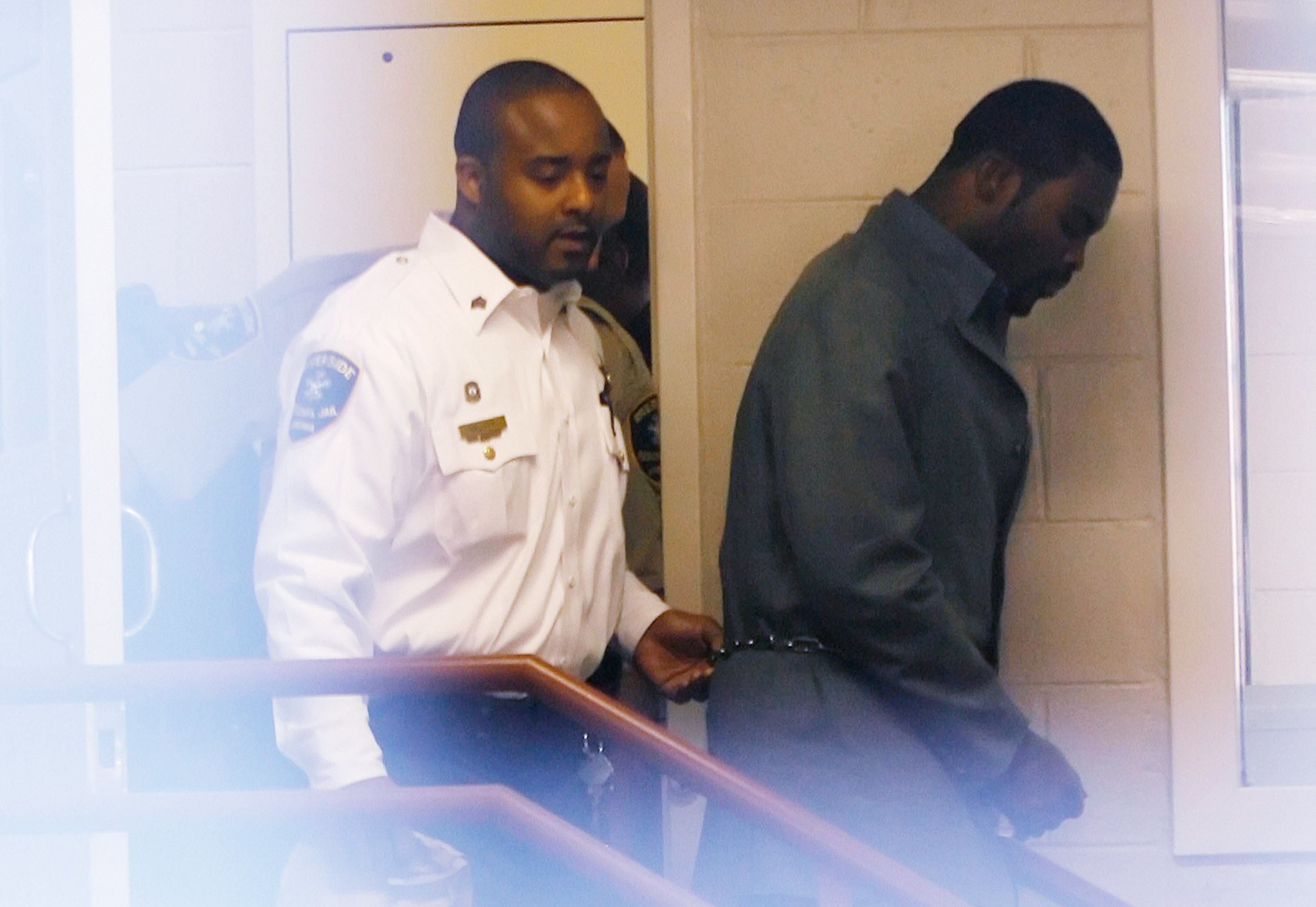 Sussex, VA - NOVEMBER 25:  Suspended Atlanta Falcons quarterback Michael Vick (R) leaves Surry County Circuit Court after entering a guilty plea on two felony counts connected to dog fighting on November 25, 2008 in Sussex, Virginia. Under a plea agreemen
