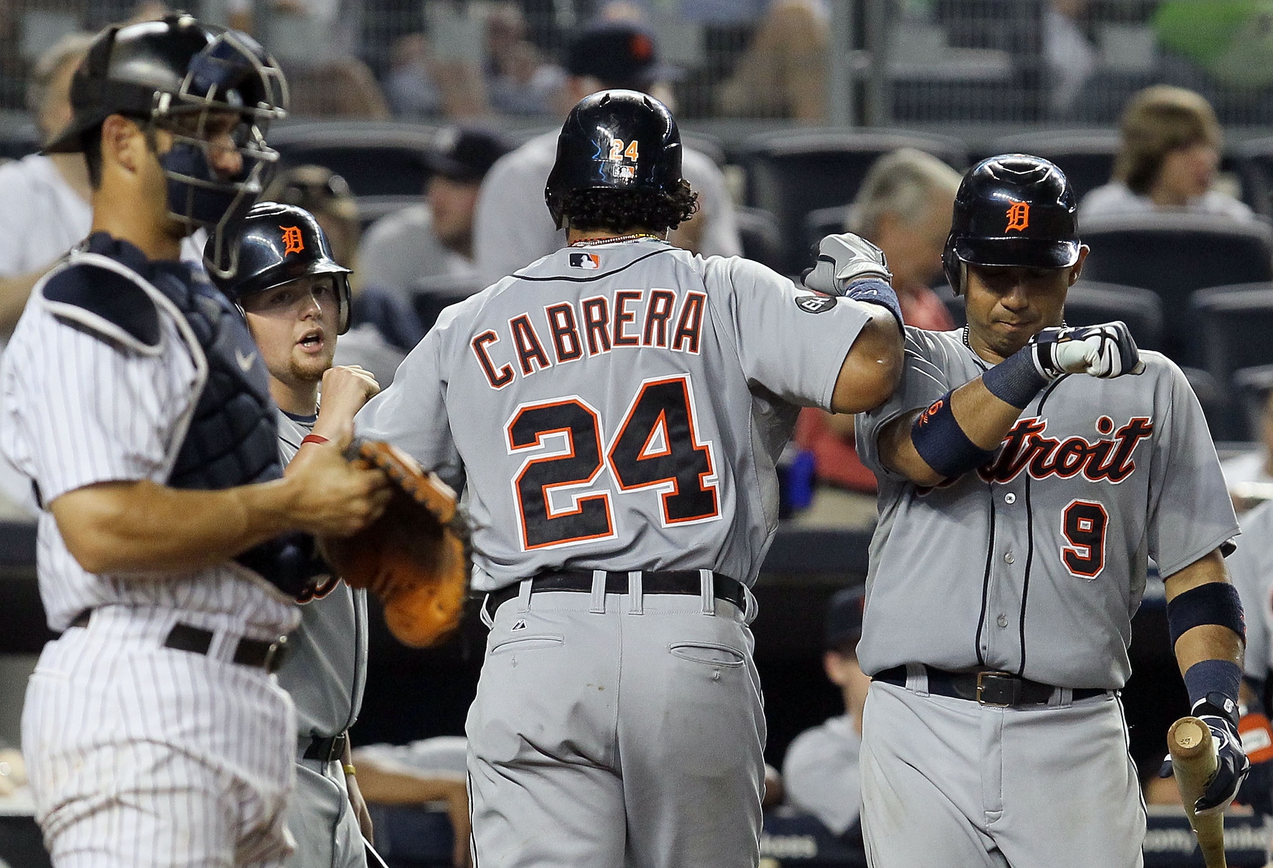 NEW YORK - AUGUST 16: Miguel Cabrera #24 of the Detroit Tigers celebrates his ninth inning home run against the New York Yankees with teammate Carlos Guillen #9 on August 16, 2010 at Yankee Stadium in the Bronx borough of New York City. The Tigers defeat NEW YORK - AUGUST 16: Miguel Cabrera #24 of the Detroit Tigers celebrates his ninth inning home run against the New York Yankees with teammate Carlos Guillen #9 on August 16, 2010 at Yankee Stadium in the Bronx borough of New York City. The Tigers defeat