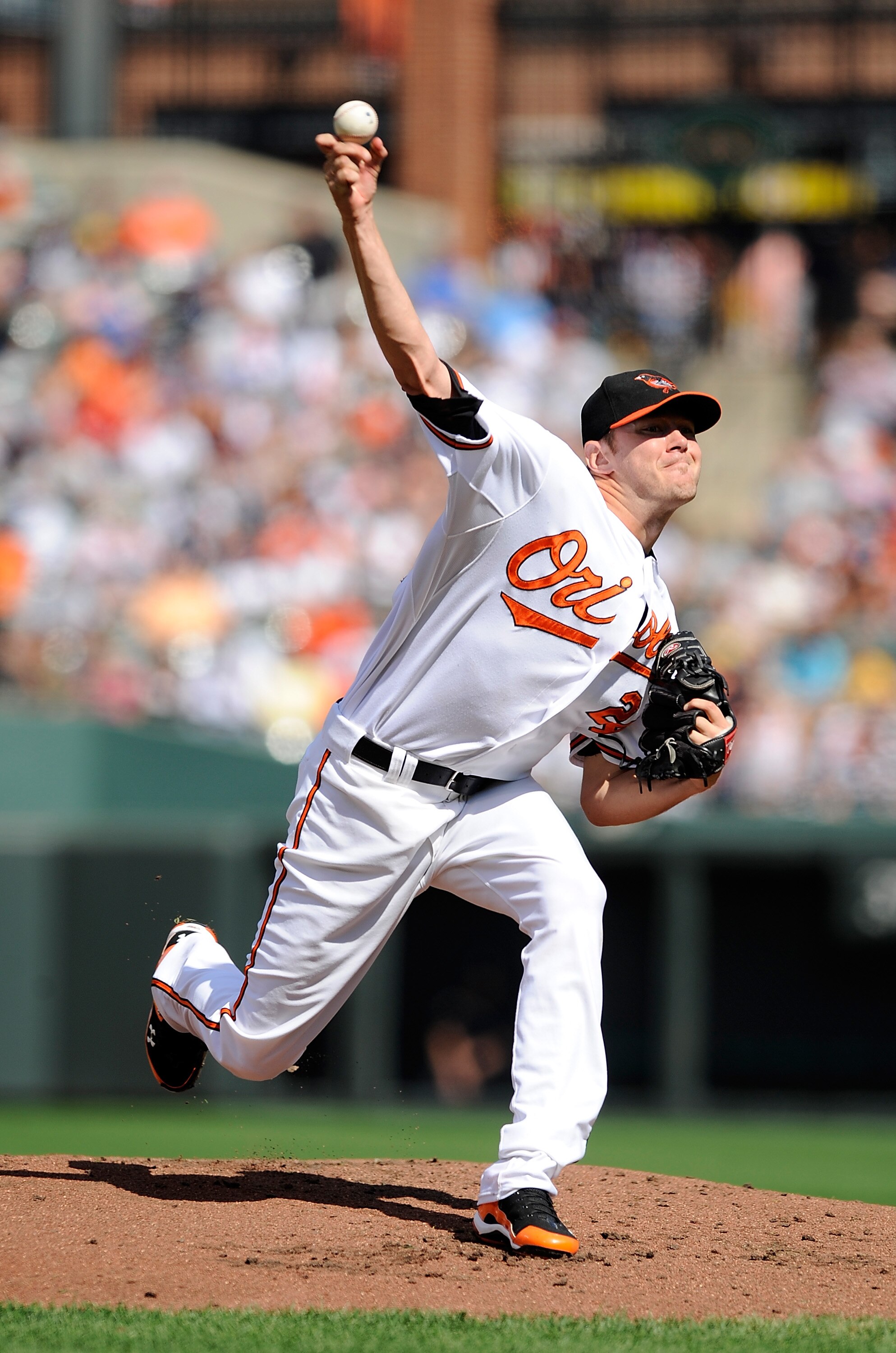 BALTIMORE - SEPTEMBER 19:  Chris Tillman #24 of the Baltimore Orioles pitches against the New York Yankees at Camden Yards on September 19, 2010 in Baltimore, Maryland.  (Photo by Greg Fiume/Getty Images)