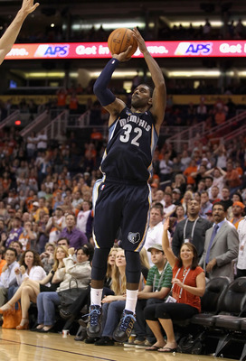   O.J. Mayo #32 of the Memphis Grizzlies puts up a shot during the NBA game against the Phoenix Suns at US Airways Center on November 5, 2010 in Phoenix, Arizona. NOTE TO USER: User expressly acknowledges and agrees that, by download