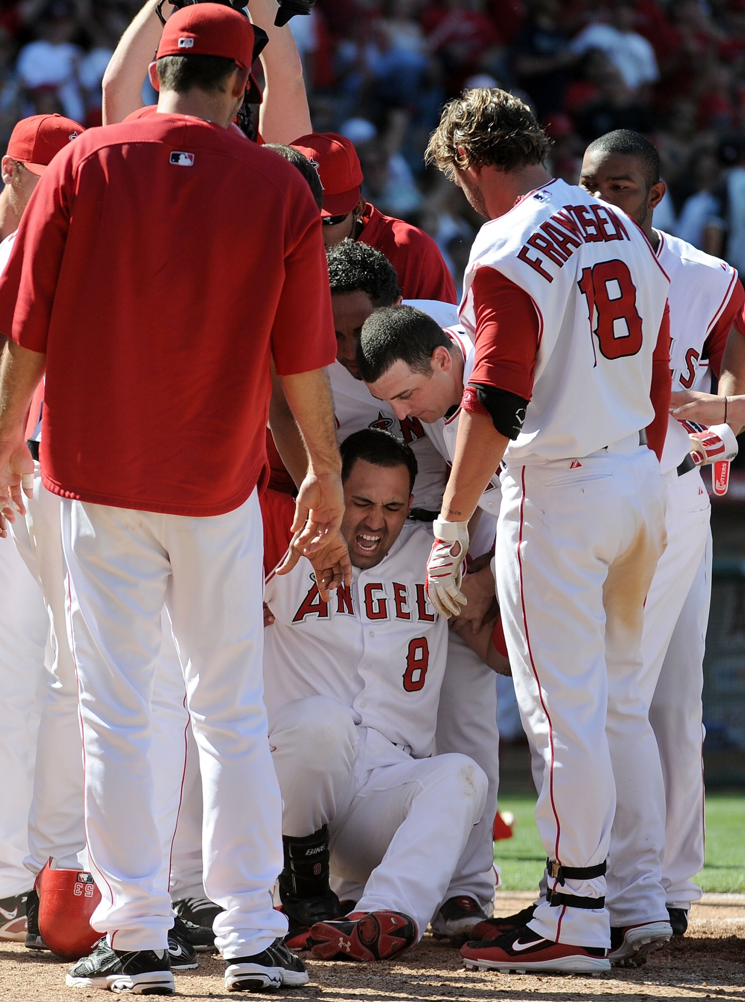 ANAHEIM, CA - MAY 29: Kendry Morales #8 of the Los Angeles Angels reacts to his injury on his way to home plate after his grand slam homerun to win the game 5-1 over the Seattle Mariners during the bottom of the ninth inning at Angel Stadium on May 29, 2 ANAHEIM, CA - MAY 29: Kendry Morales #8 of the Los Angeles Angels reacts to his injury on his way to home plate after his grand slam homerun to win the game 5-1 over the Seattle Mariners during the bottom of the ninth inning at Angel Stadium on May 29, 2