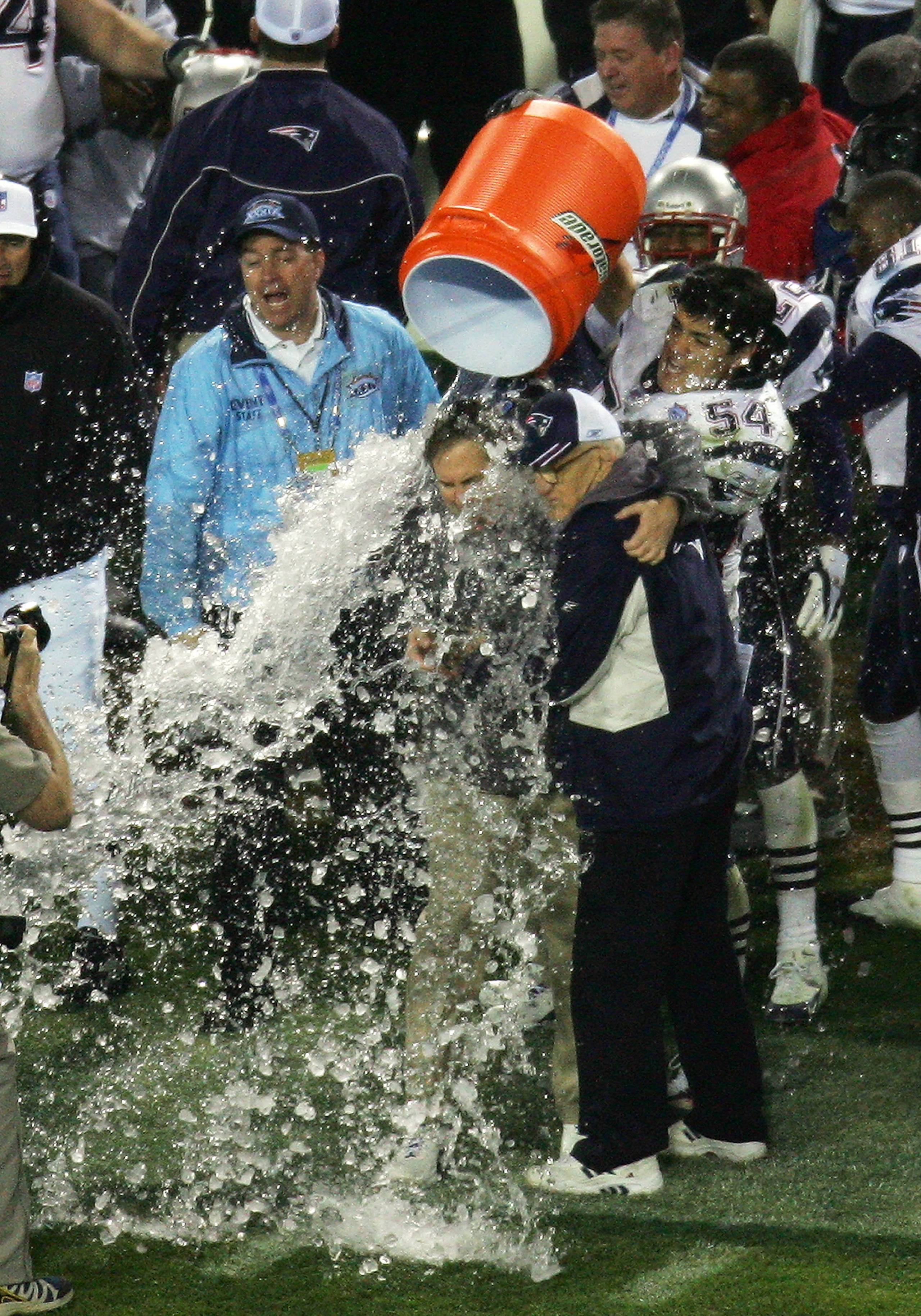 JACKSONVILLE, FL - FEBRUARY 6:   Linebacker Tedy Bruschi #54 of the New England Patriots pours the Gatorade tub over head coach Bill Belichick before defeating the Philadelphia Eagles in Super Bowl XXXIX at Alltel Stadium on February 6, 2005 in Jacksonvil
