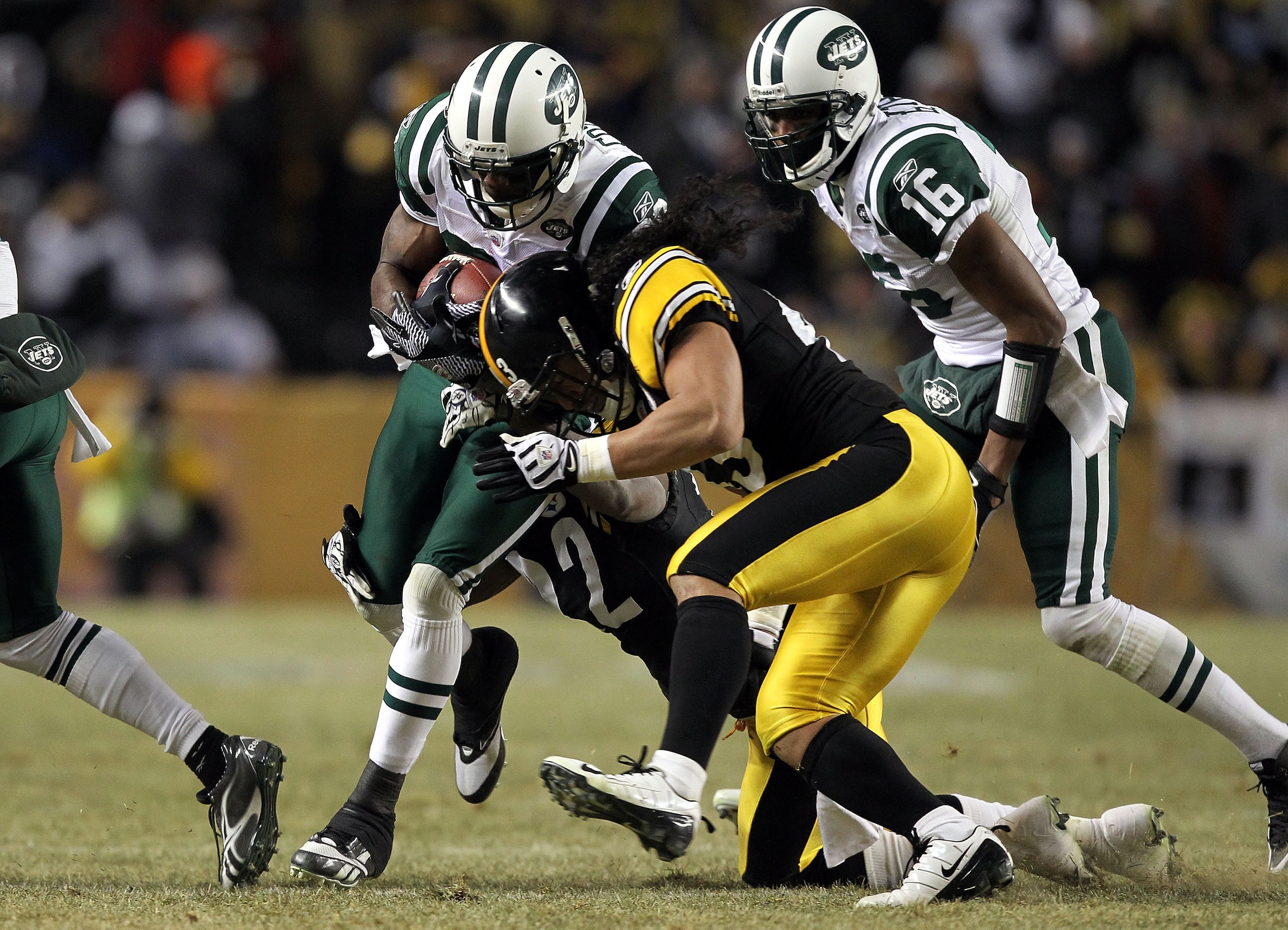 PITTSBURGH, PA - JANUARY 23:  Troy Polamalu #43 of the Pittsburgh Steelers hits Jerricho Cotchery #89 of the New York Jets during the 2011 AFC Championship game at Heinz Field on January 23, 2011 in Pittsburgh, Pennsylvania. The Steelers won 24-19. (Photo