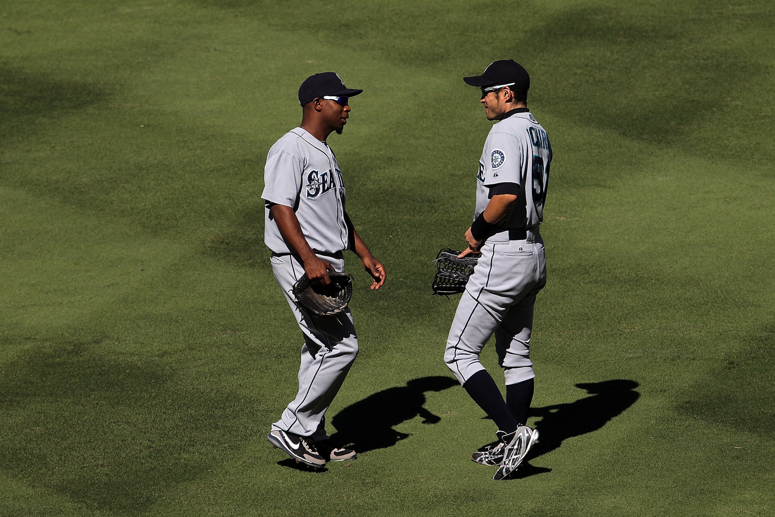 ARLINGTON, TX - SEPTEMBER 29: Second baseman Chone Figgins #9 and Ichiro Suzuki #51 of the Seattle Mariners at Rangers Ballpark in Arlington on September 29, 2010 in Arlington, Texas. (Photo by Ronald Martinez/Getty Images) ARLINGTON, TX - SEPTEMBER 29: Second baseman Chone Figgins #9 and Ichiro Suzuki #51 of the Seattle Mariners at Rangers Ballpark in Arlington on September 29, 2010 in Arlington, Texas. (Photo by Ronald Martinez/Getty Images)