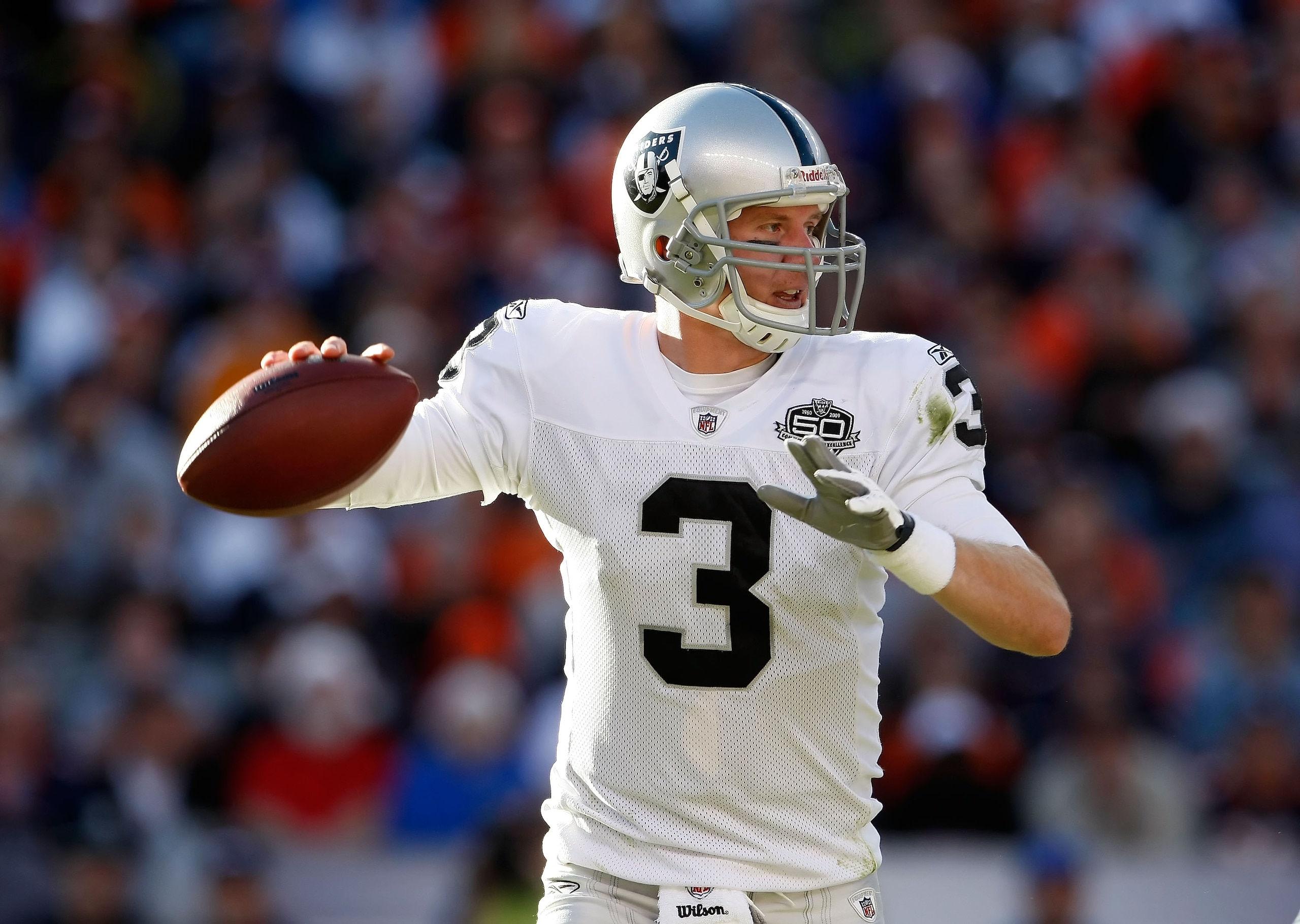 DENVER - DECEMBER 20:  Charlie Frye #3 of the Oakland Raiders drops back to pass against the Denver Broncos at Invesco Field at Mile High on December 20, 2009 in Denver, Colorado.  (Photo by Jeff Gross/Getty Images)
