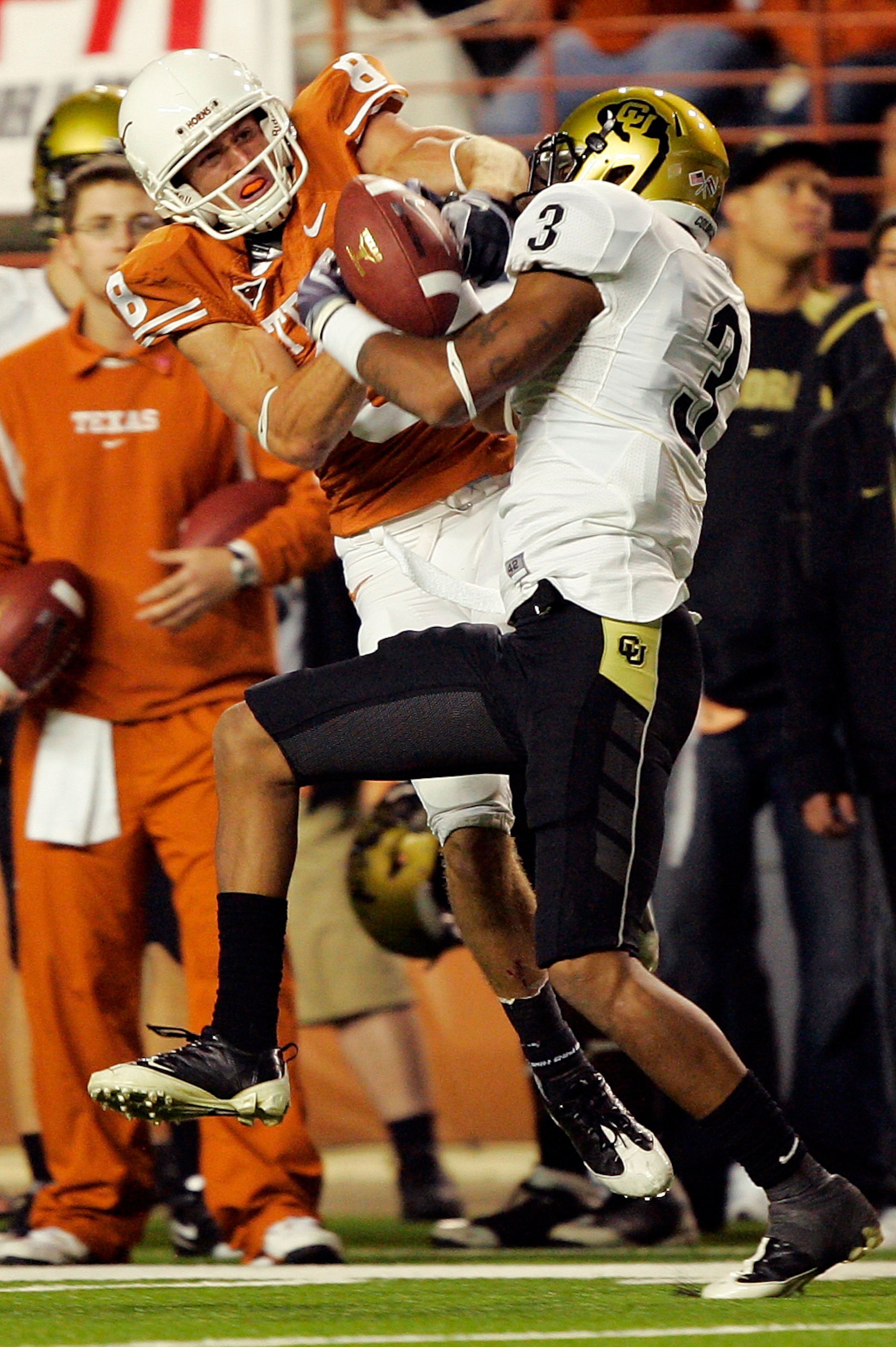 AUSTIN, TX - OCTOBER 10: Jordan Shipley #8 of the Texas Longhorns wrestles for control of the ball with cornerback Jimmy Smith #3 of the Colorado Buffaloes for an incomplete pass on October 10, 2009 at Darrell K Royal-Texas Memorial Stadium in Austin, Tex