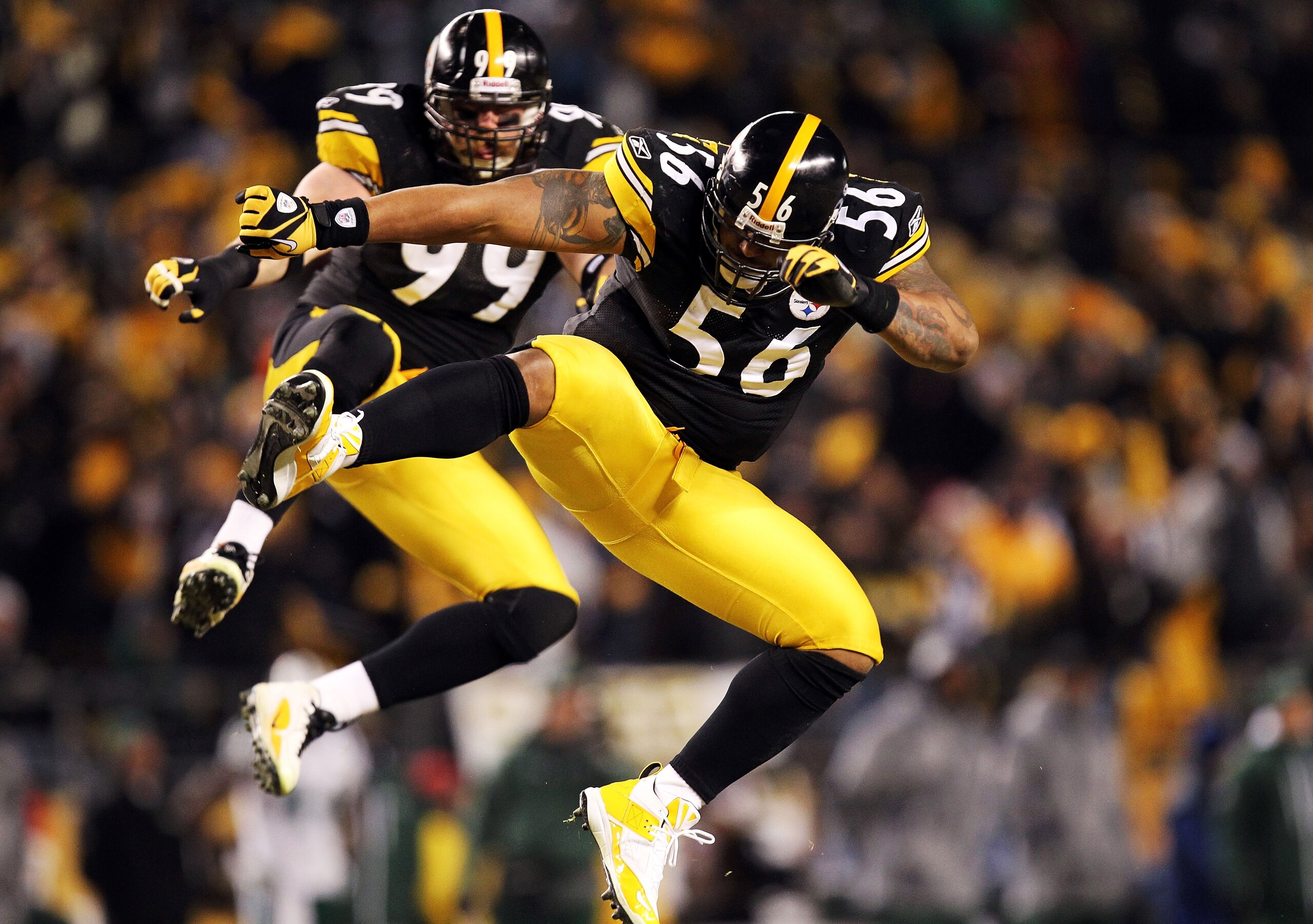 PITTSBURGH, PA - JANUARY 23:  (FILE PHOTO)  LaMarr Woodley #56 and Brett Keisel #99 of the Pittsburgh Steelers celebrate after sacking Mark Sanchez #6 of the New York Jets during the 2011 AFC Championship game at Heinz Field on January 23, 2011 in Pittsbu