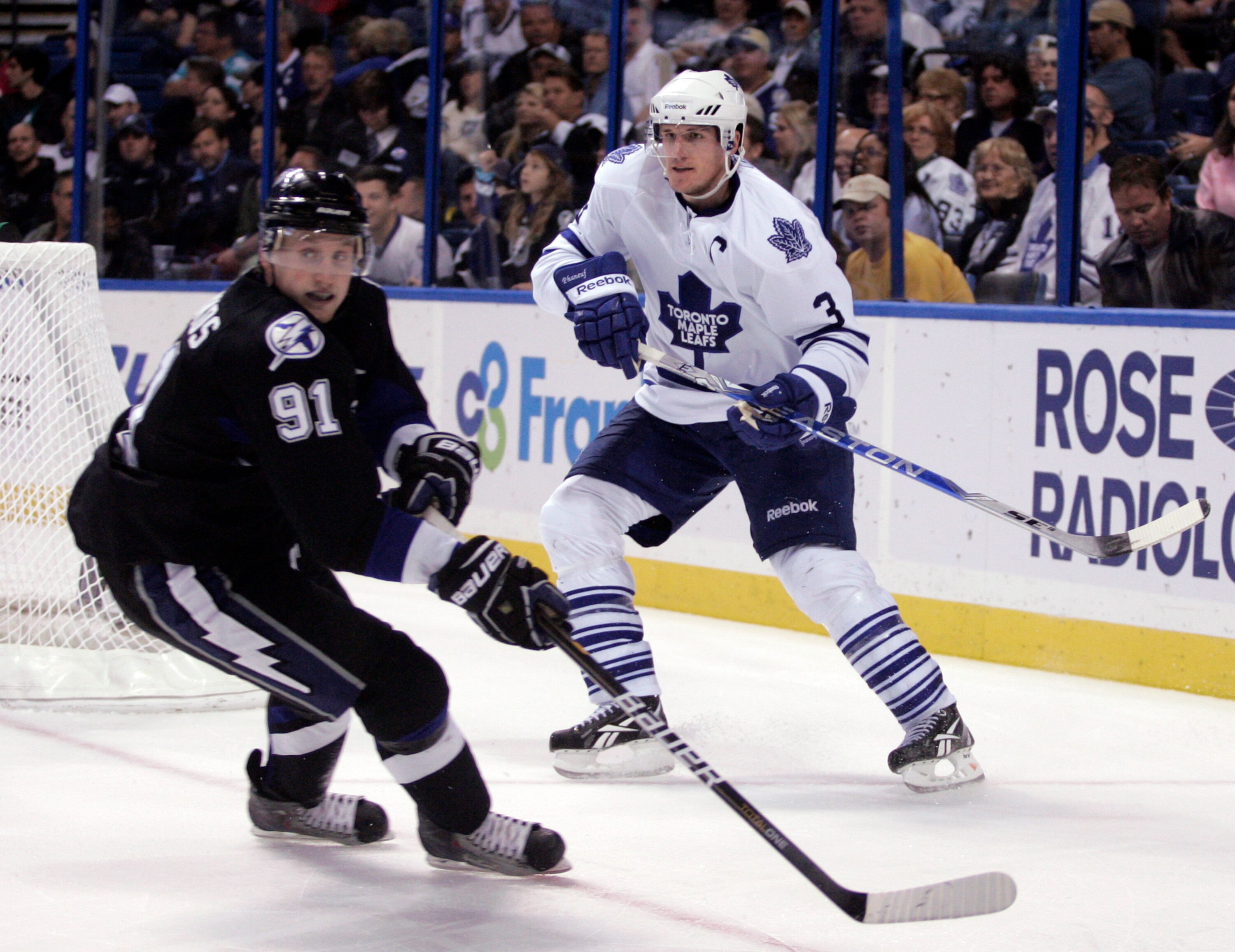 TAMPA, FL - JANUARY 25: Dion Phaneuf #3 of the Toronto Maple Leafs skates against Steven Stamkos #91 of the Tampa Bay Lightning at St. Pete Times Forum on January 25, 2011 in Tampa, Florida. The Lightning defeated the Leafs 2-0. (Photo by Justin K. Aller/