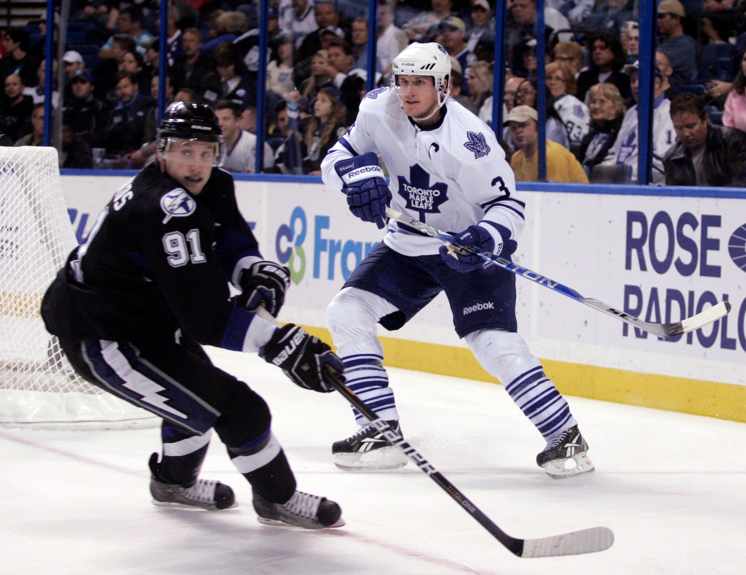 TAMPA, FL - JANUARY 25: Dion Phaneuf #3 of the Toronto Maple Leafs skates against Steven Stamkos #91 of the Tampa Bay Lightning at St. Pete Times Forum on January 25, 2011 in Tampa, Florida. The Lightning defeated the Leafs 2-0. (Photo by Justin K. Aller/