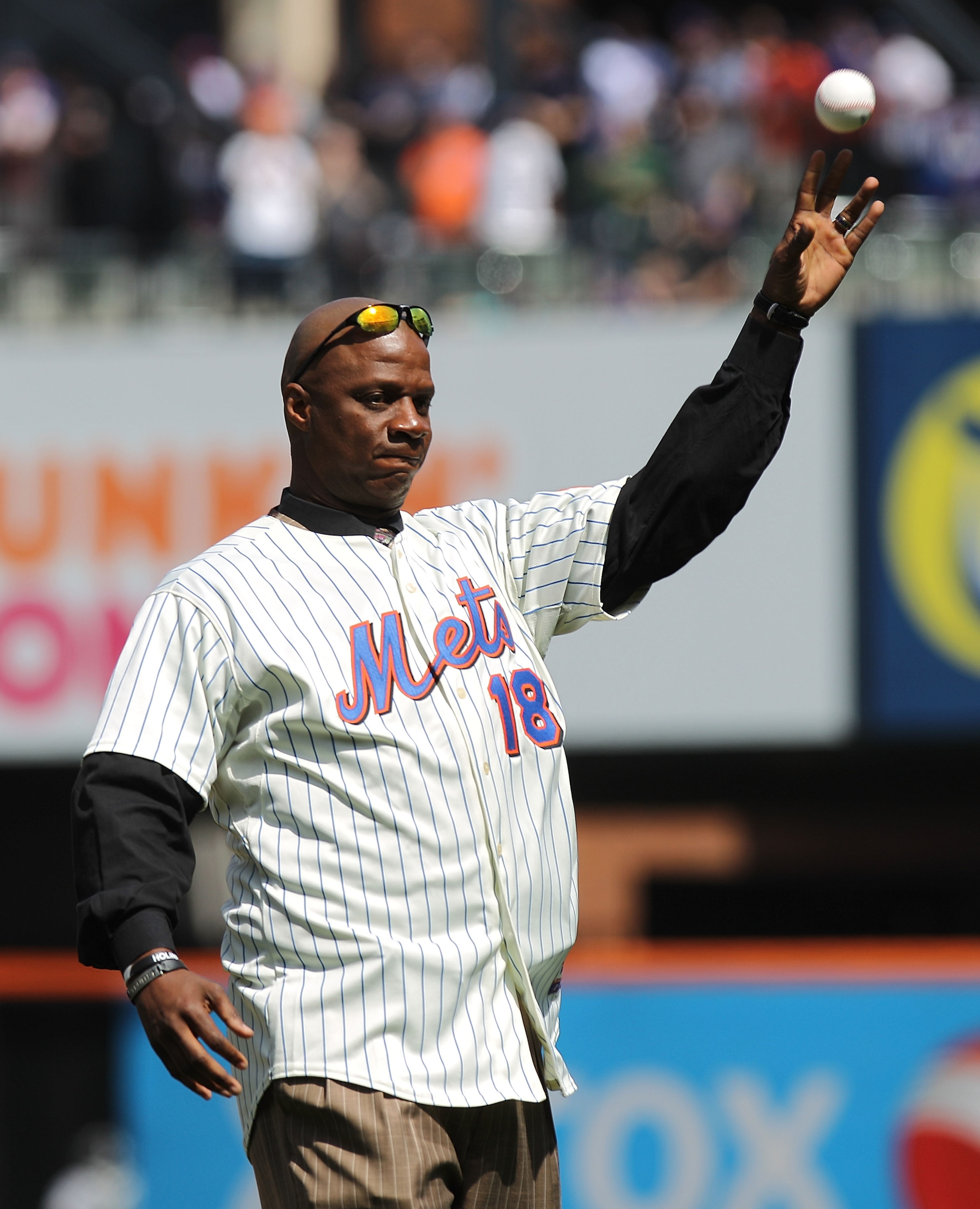 NEW YORK - APRIL 05:  Former New York Mets player, Darryl Strawberry throws out the ceremonial first pitch prior to the game between the New York Mets and the Florida Marlins during their Opening Day Game at Citi Field on April 5, 2010 in the Flushing nei