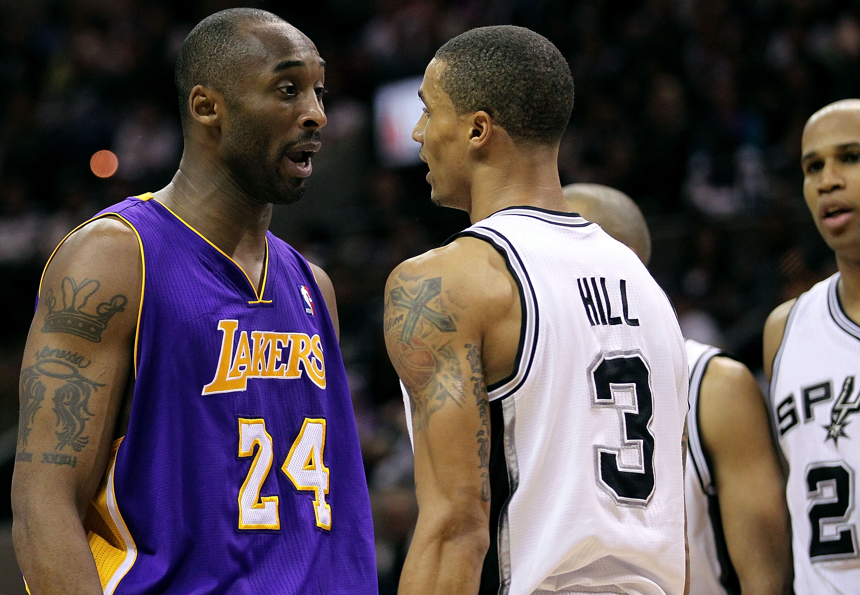 SAN ANTONIO, TX - DECEMBER 28:  Guard Kobe Bryant #24 of the Los Angeles Lakers and George Hill #3 of the San Antonio Spurs confront one another in the second quarter at AT&T Center on December 28, 2010 in San Antonio, Texas.  NOTE TO USER: User expressly
