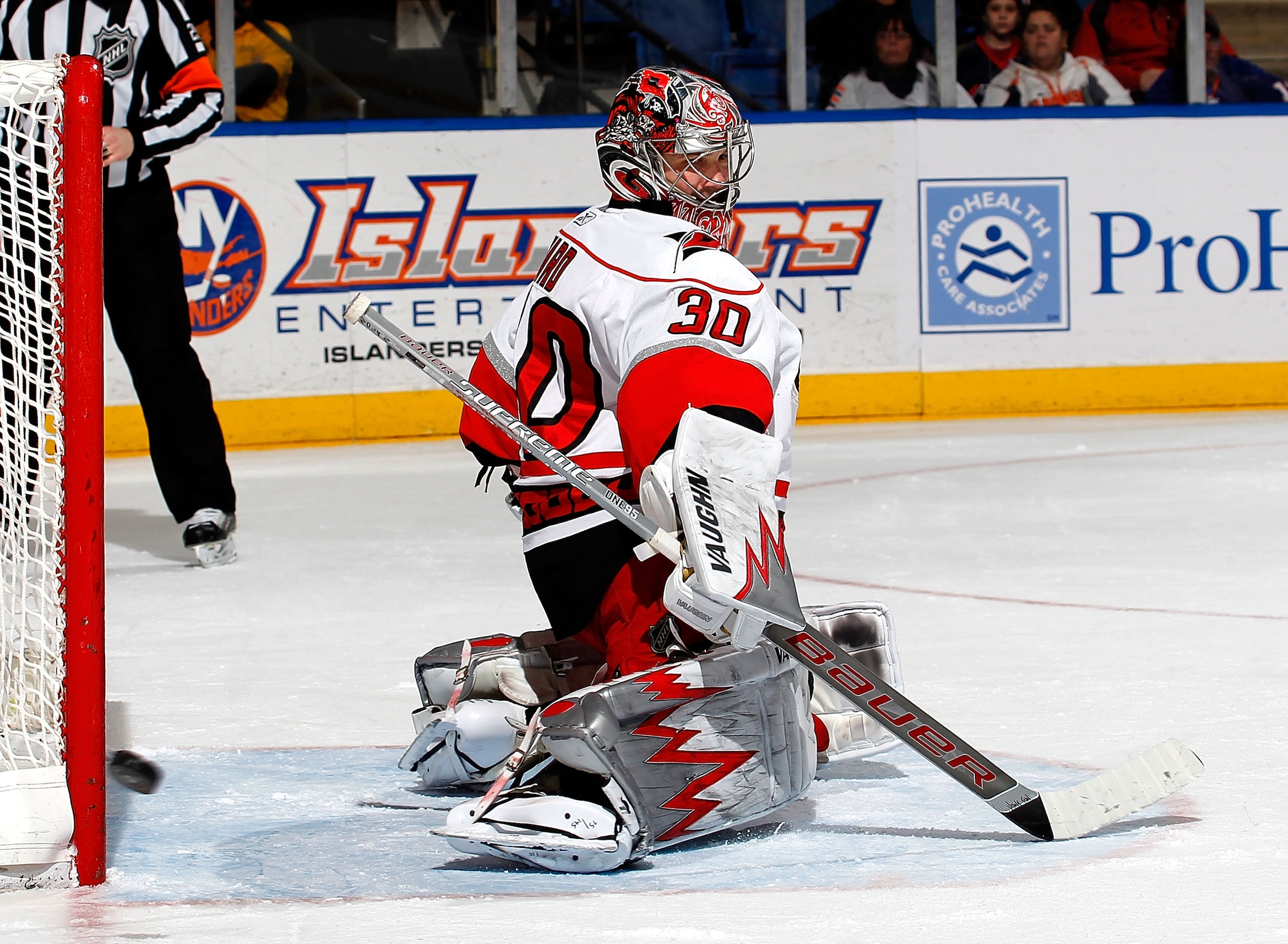 UNIONDALE, NY - JANUARY 26: Goalie Cam Ward #30 of the Carolina Hurricanes turns to see a shot by the New York Islanders hit the post during the second period of an NHL hockey game at the Nassau Coliseum on January 26, 2011 in Uniondale, New York.  (Photo