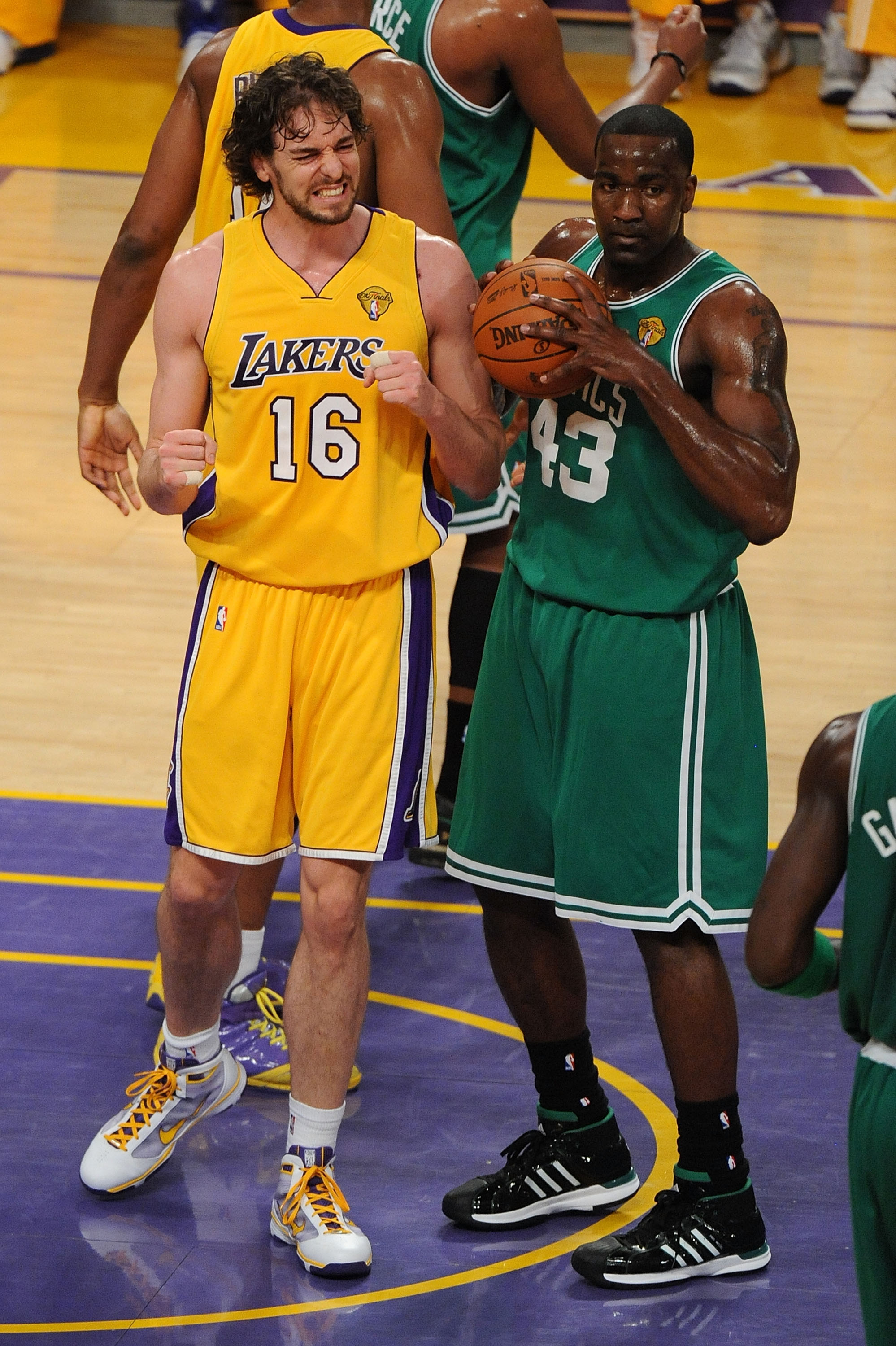 LOS ANGELES, CA - JUNE 15:  Pau Gasol #16 of the Los Angeles Lakers reacts alongside Kendrick Perkins #43 of the Boston Celtics in the first period of Game Six of the 2010 NBA Finals at Staples Center on June 15, 2010 in Los Angeles, California.  NOTE TO