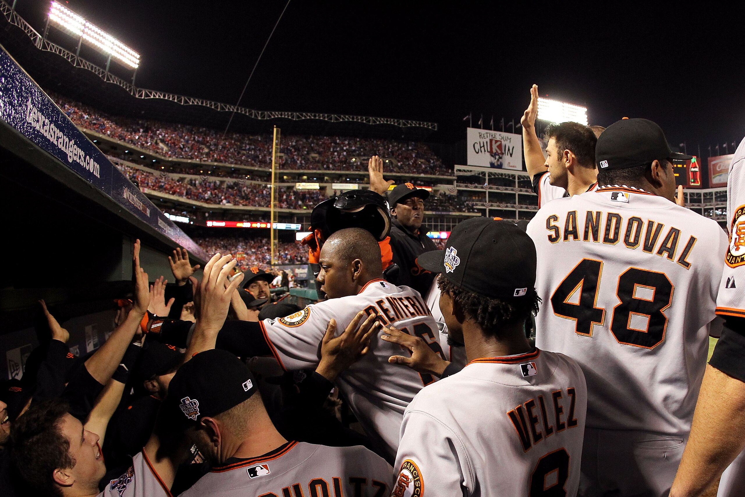 ARLINGTON, TX - NOVEMBER 01: Edgar Renteria #16 of the San Francisco Giants celebrates with his teammates in the dugout after he hit a 3-run home run in the seventh inning against the Texas Rangers in Game Five of the 2010 MLB World Series at Rangers Bal ARLINGTON, TX - NOVEMBER 01: Edgar Renteria #16 of the San Francisco Giants celebrates with his teammates in the dugout after he hit a 3-run home run in the seventh inning against the Texas Rangers in Game Five of the 2010 MLB World Series at Rangers Bal