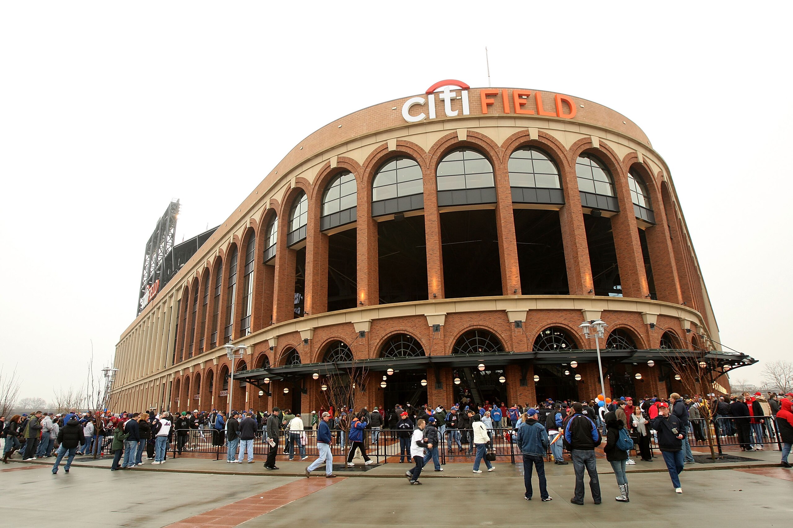 FLUSHING, NY - MARCH 29:  Spectators wait to get in the new Citi Field before the game between the Georgetown Hoyas and St. John's Red Storm on March 29, 2009 in the Flushing neighborhood of the Queens borough of New York City. This is the first event to