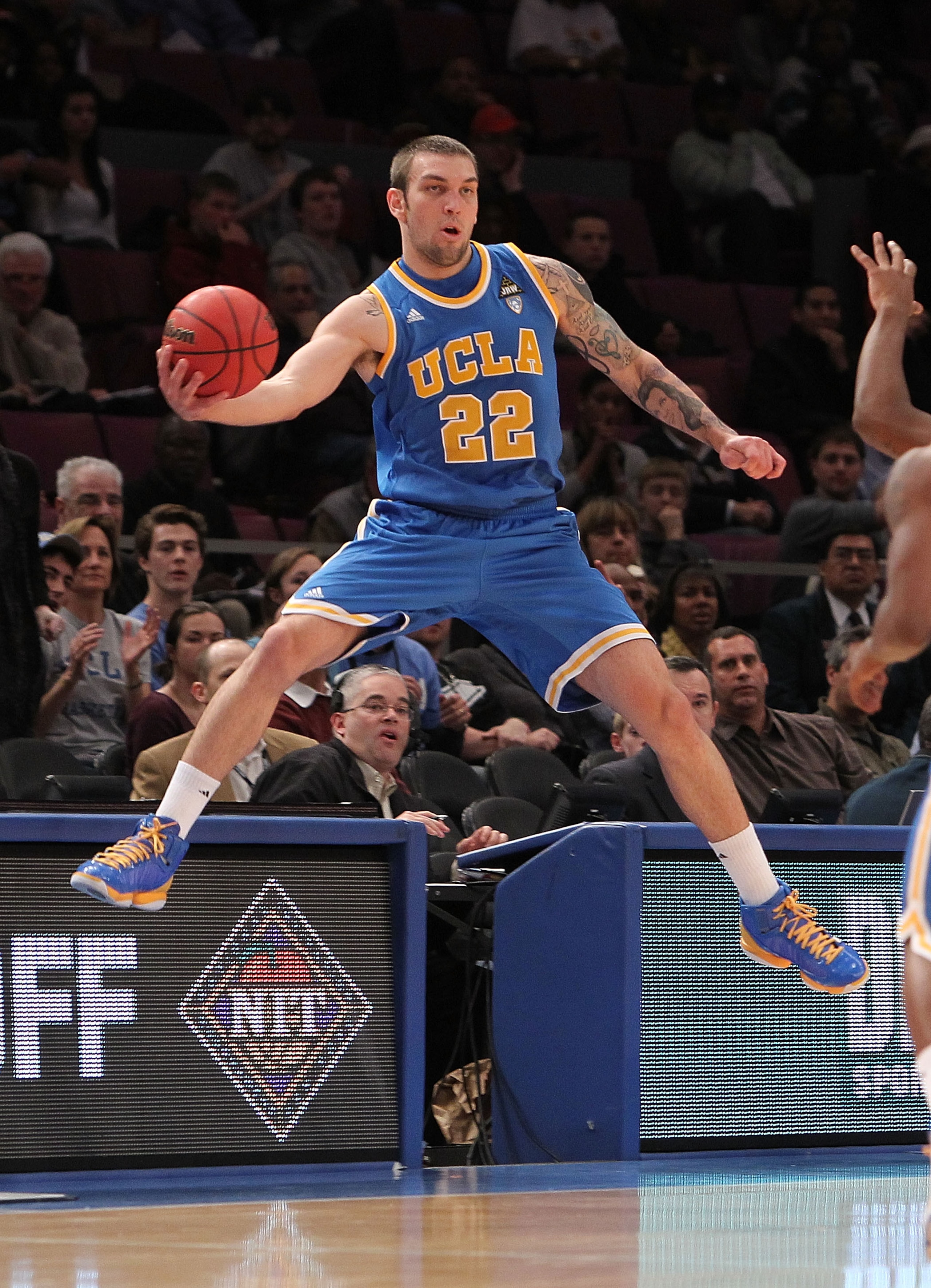 NEW YORK - NOVEMBER 24:  Reeves Nelson #22 of the UCLA Bruins keeps the ball in play against the Villanova Wildcats during their preseason NIT semifinal at Madison Square Garden on November 24, 2010 in New York City.  (Photo by Nick Laham/Getty Images)