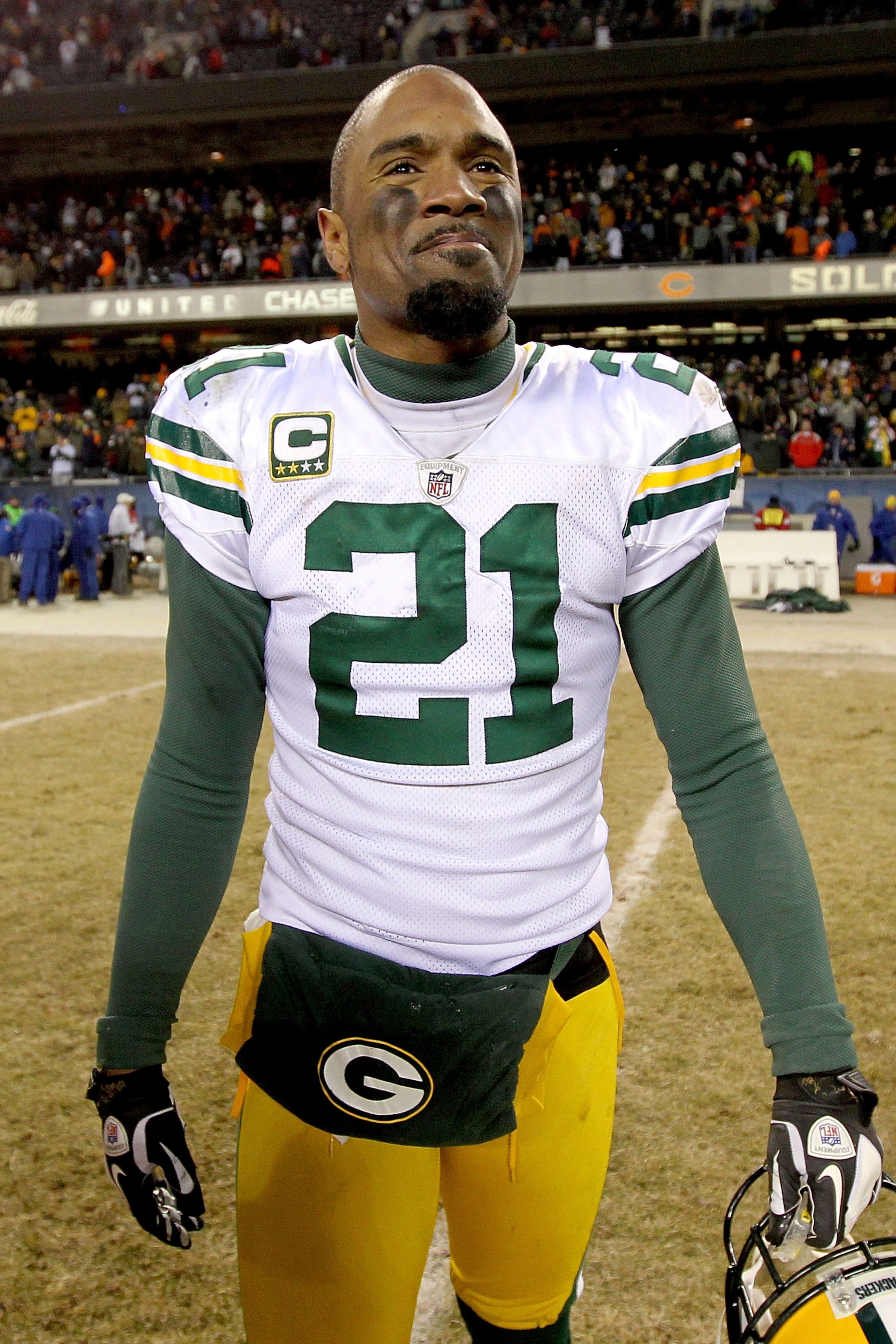 CHICAGO, IL - JANUARY 23:  Charles Woodson #21 of the Green Bay Packers reacts after the Packers 21-14 victory against the Chicago Bears in the NFC Championship Game at Soldier Field on January 23, 2011 in Chicago, Illinois.  (Photo by Andy Lyons/Getty Im