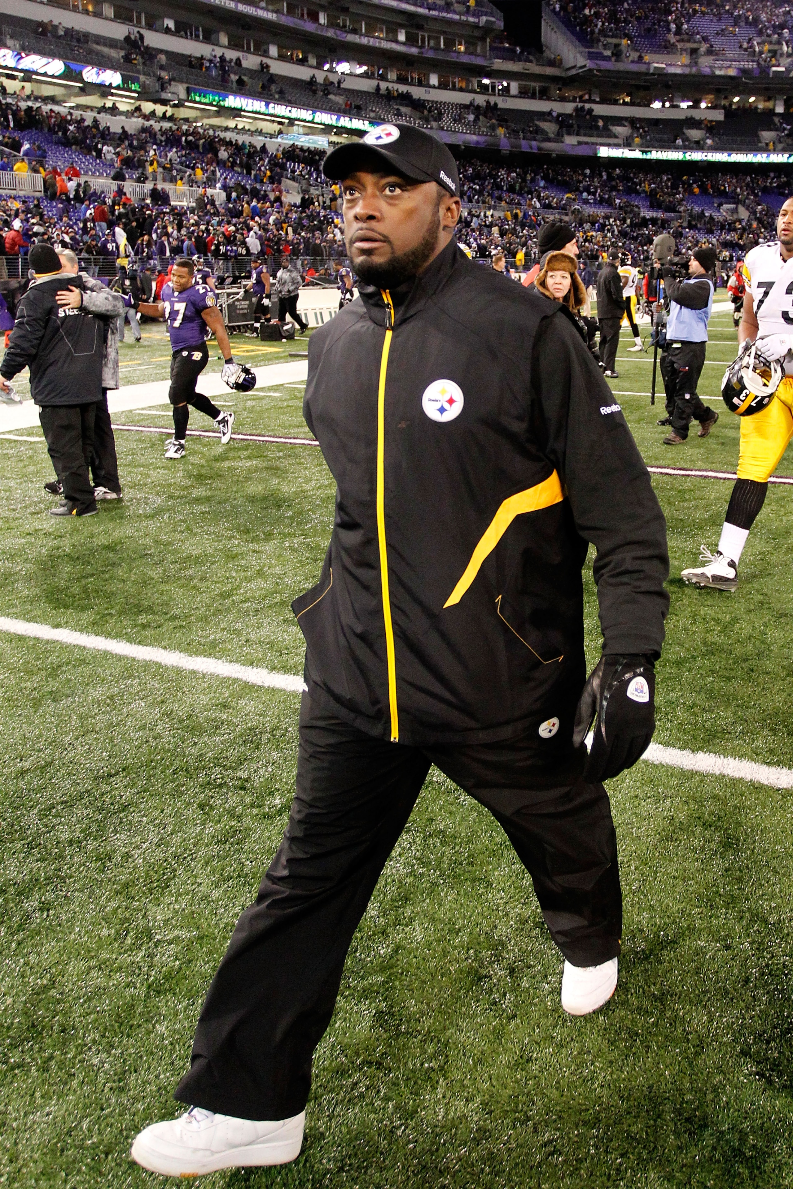 BALTIMORE, MD - DECEMBER 05:  Mike Tomlin head coach of the Pittsburgh Steelers walks off the field after defeating the Baltimore Ravens 13-10 at M&T Bank Stadium on December 5, 2010 in Baltimore, Maryland.  (Photo by Geoff Burke/Getty Images)