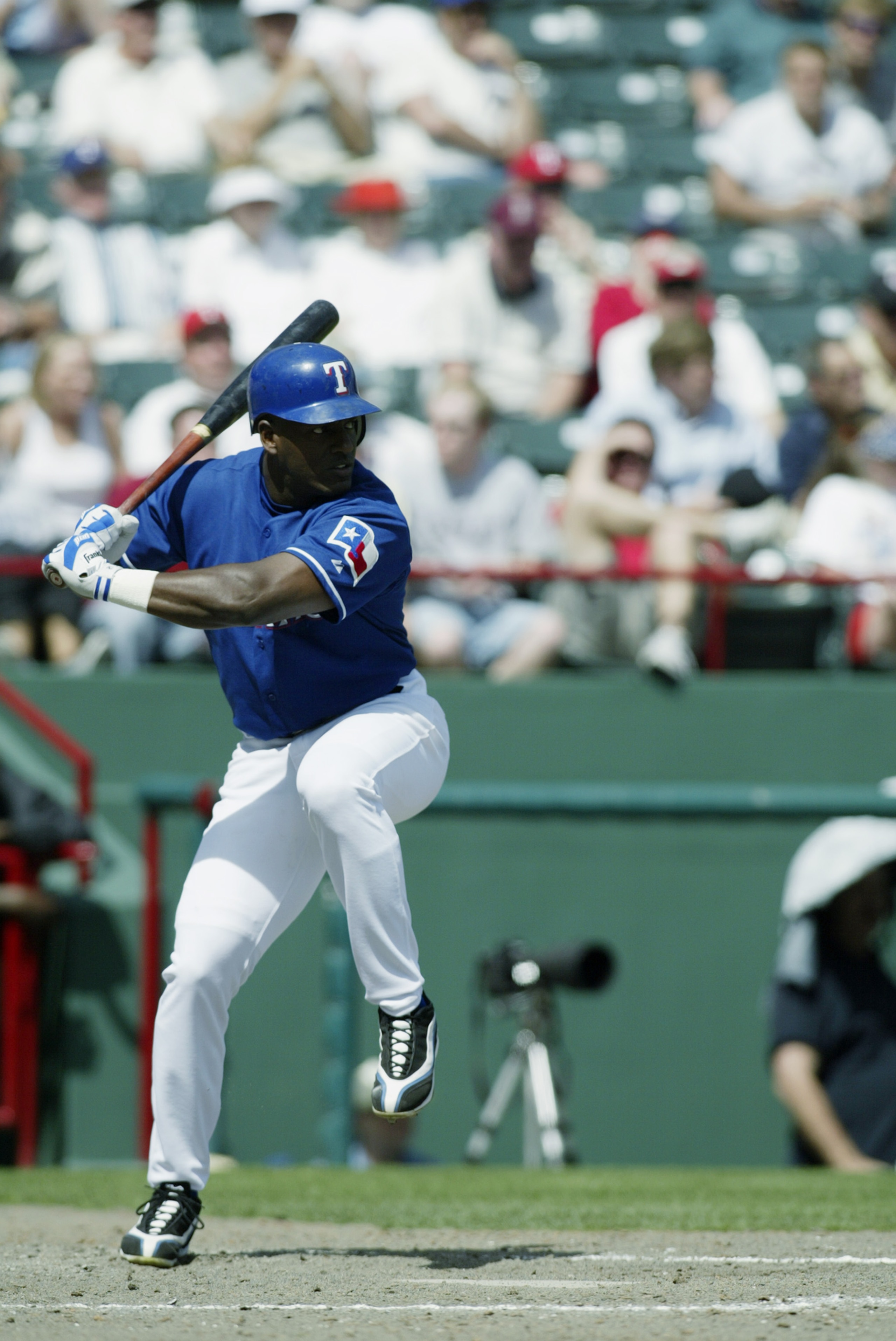ARLINGTON, TX - APRIL 10:  Ruben Sierra #21 of the Texas Rangers stands at bat during the game against the Oakland Athletics at the Ballpark in Arlington on April 10, 2003 in Arlington, Texas.  The Rangers defeated the A's 5-4.  (Photo by Ronald Martinez/