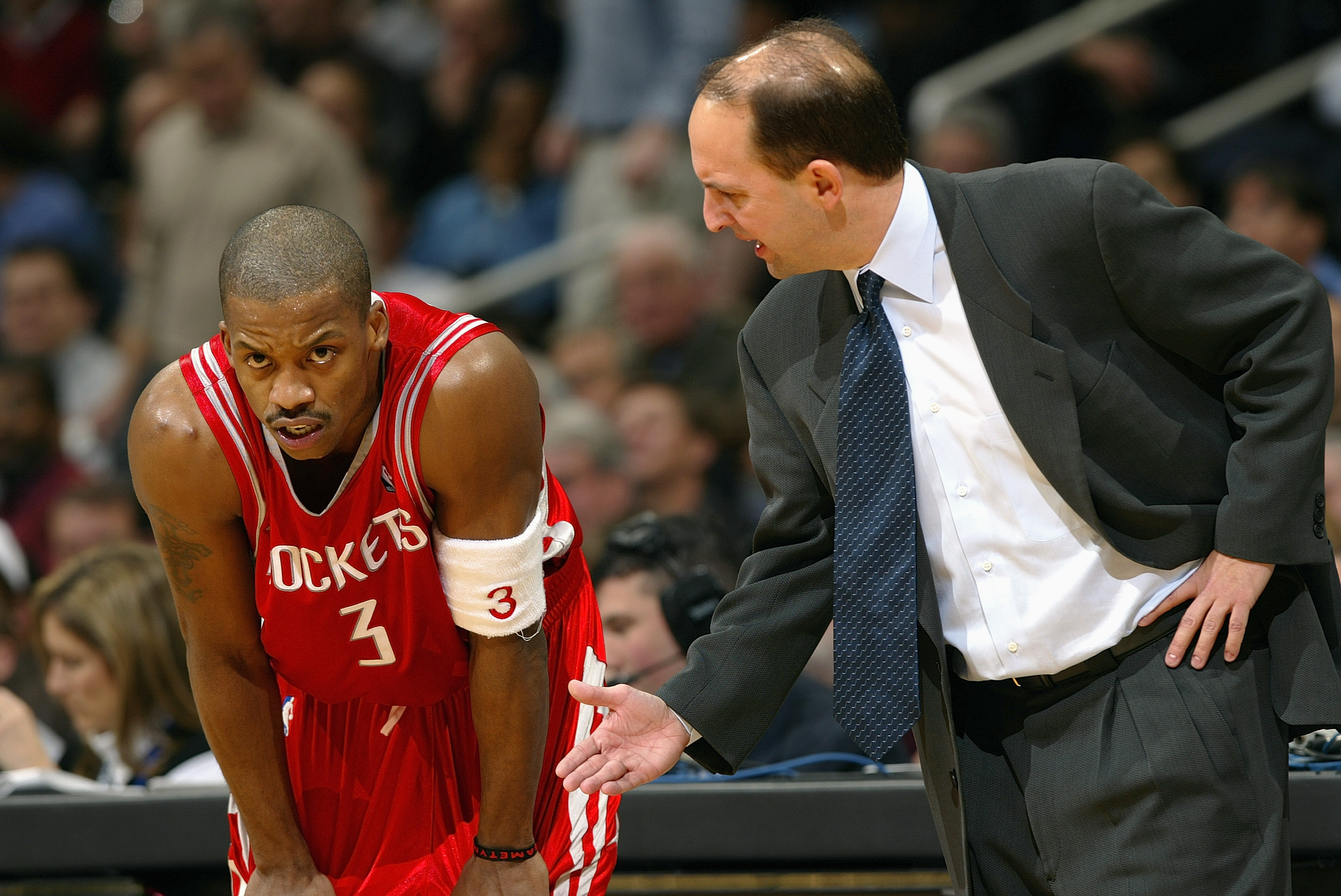 WASHINGTON - JANUARY 13:  Head coach Jeff Van Gundy of the Houston Rockets talks to his teammate Steve Francis #3 during the game against the Washington Wizards at MCI Center on January 13, 2004 in Washington, DC.  The Rockets won 93-80.  NOTE TO USER: Us