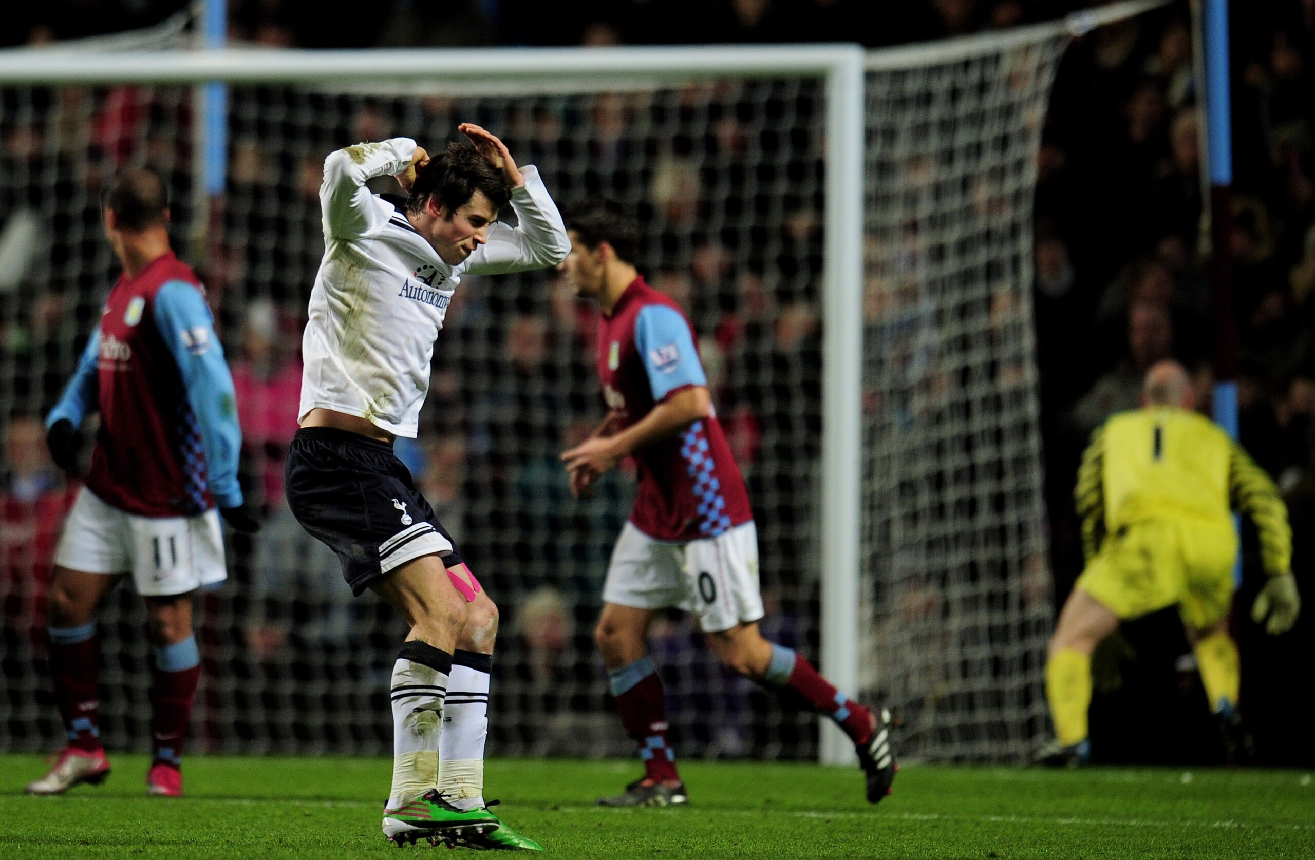 BIRMINGHAM, ENGLAND - DECEMBER 26:  Gareth Bale of Tottenham reacts after missing a free kick during the Barclays Premier League match between Aston Villa and Tottenham Hotspur at Villa Park on December 26, 2010 in Birmingham, England.  (Photo by Shaun Bo