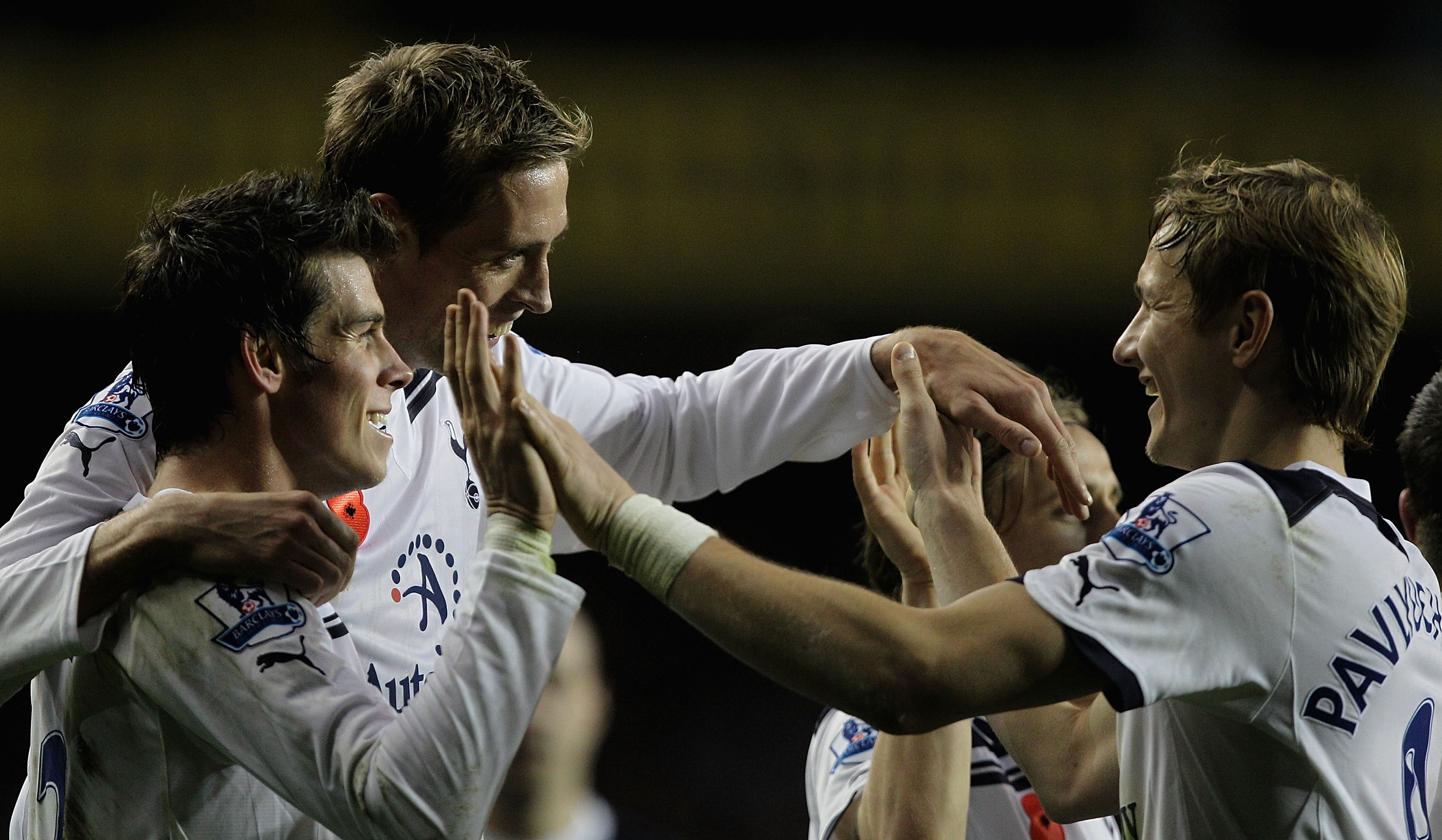 LONDON, ENGLAND - NOVEMBER 13:  (L - R) Gareth Bale, Peter Crouch and Roman Pavlyuchenko goal scorers for Tottenham celebrate after Crouch scored their third goal during the Barclays Premier League match between Tottenham Hotspur and Blackburn Rovers at W