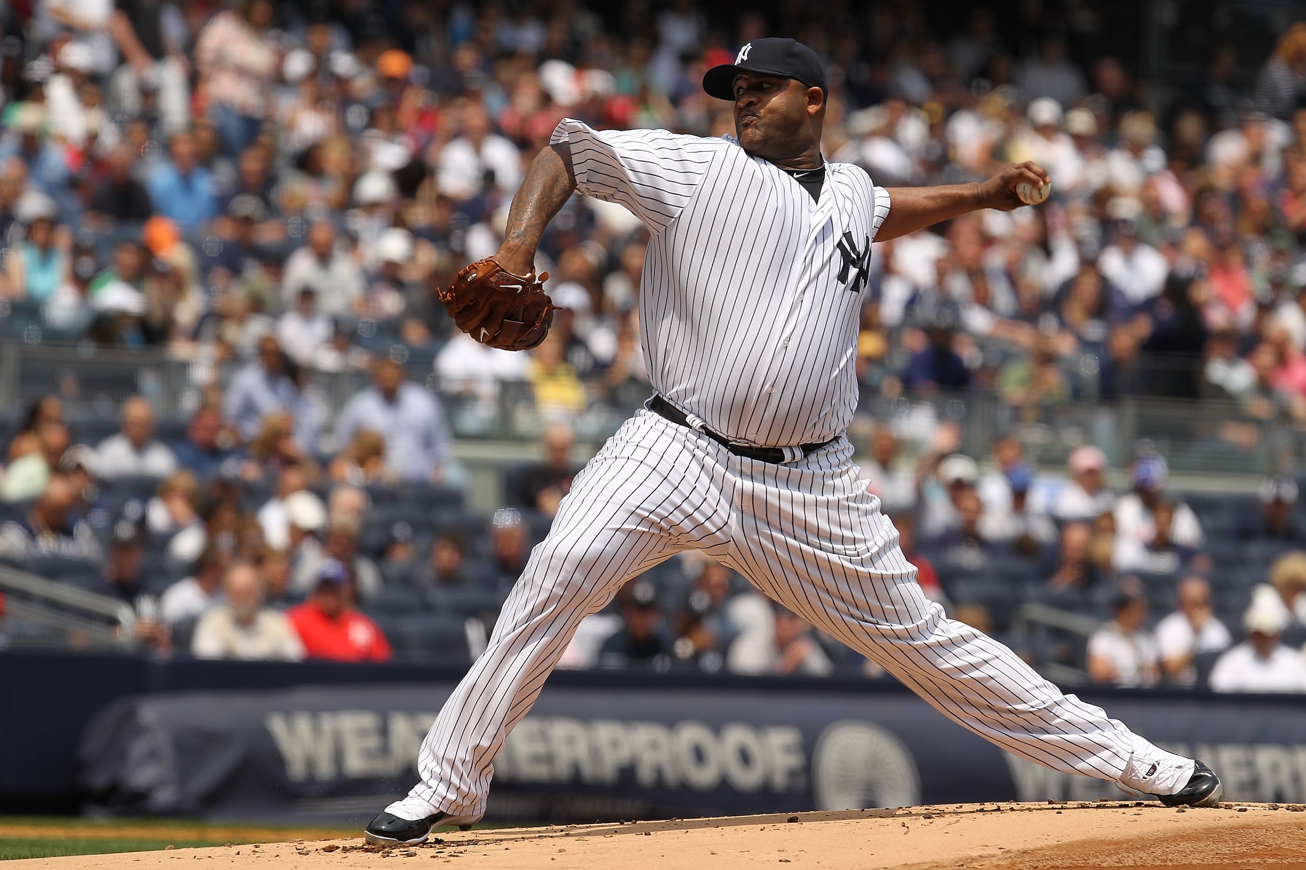 NEW YORK - MAY 29:  CC Sabathia #52 of the New York Yankees pitches against the Cleveland Indians on May 29, 2010 at Yankee Stadium in the Bronx borough of New York City.  (Photo by Al Bello/Getty Images)