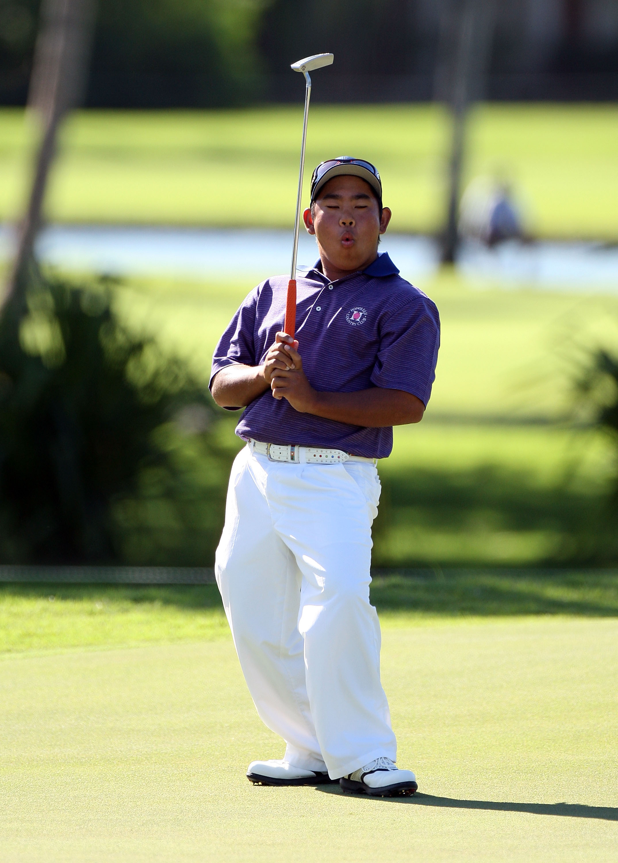 HONOLULU - JANUARY 17:  Tadd Fujikawa reacts to a missed birdie putt on the 14th hole during the third round of the Sony Open at Waialae Country Club on January 17, 2009 in Honolulu, Hawaii.  (Photo by Sam Greenwood/Getty Images)