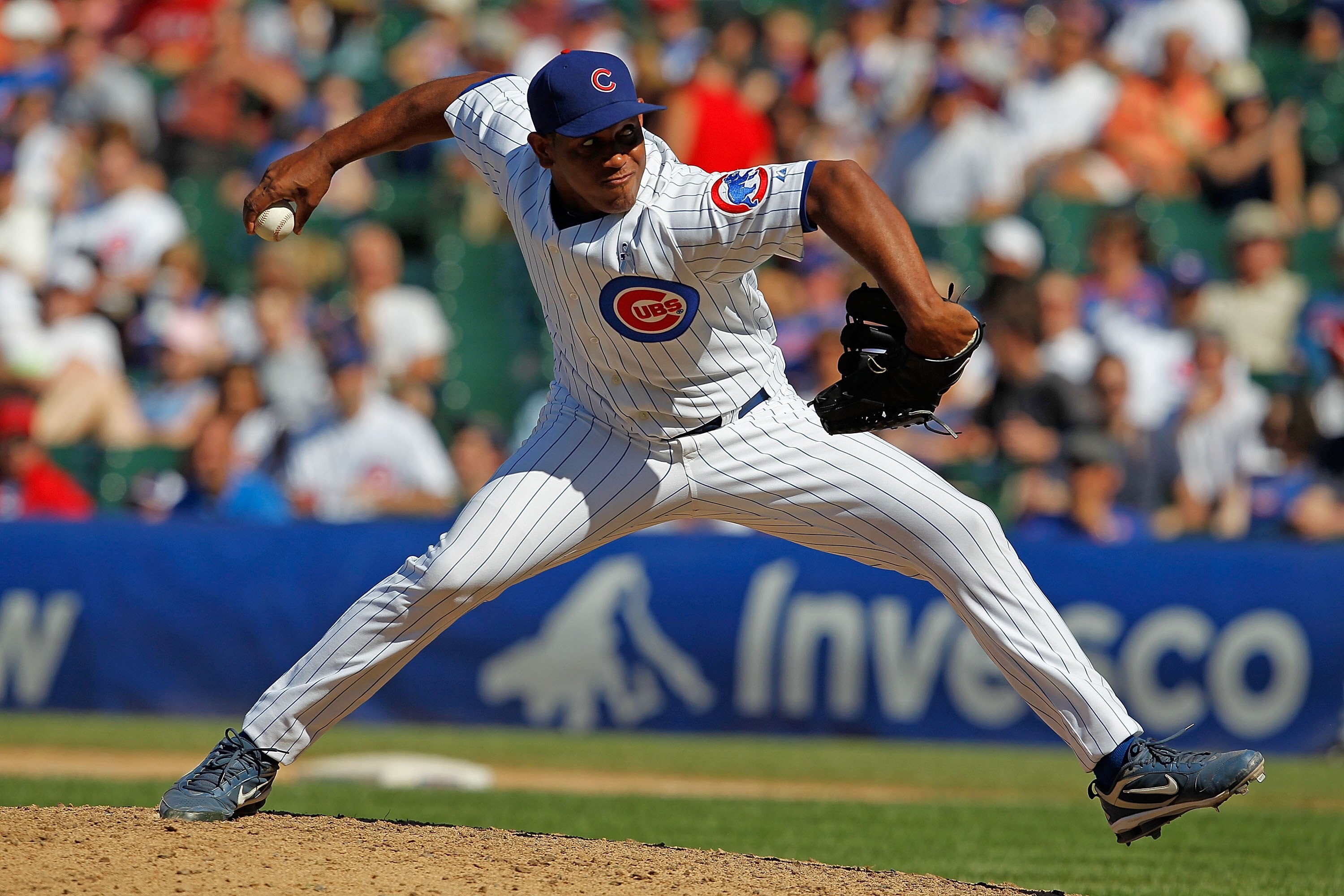 CHICAGO - JUNE 20: Carlos Marmol #49 of the Chicago Cubs pitches in the 9th inning against the Los Angeles Angels of Anaheim at Wrigley Field on June 20, 2010 in Chicago, Illinois. The Cubs defeated the Angels 12-1. (Photo by Jonathan Daniel/Getty Images)