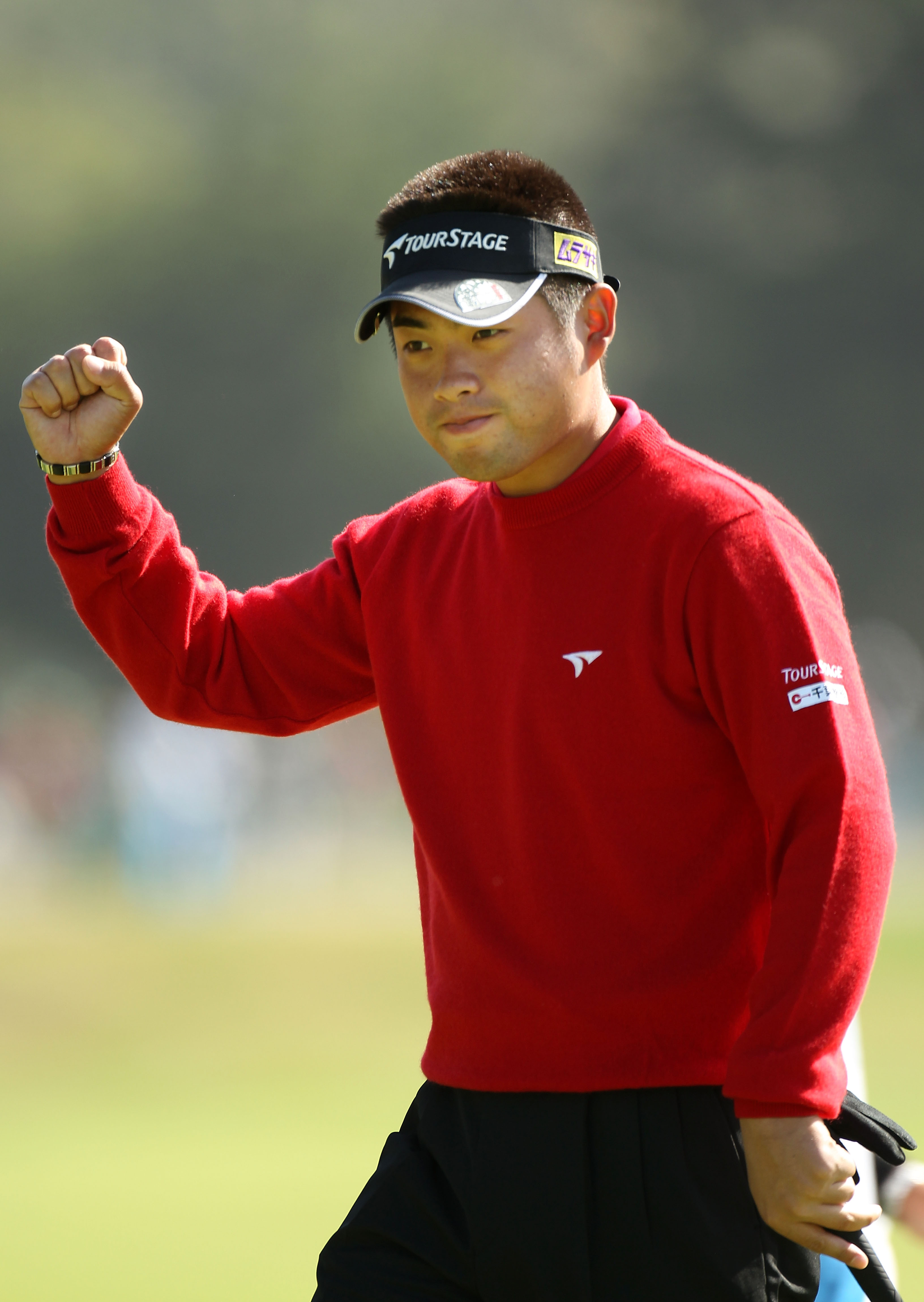 PEBBLE BEACH, CA - JUNE 17:  Yuta Ikeda of Japan  celebrates a birdie putt on the third green during the first round of the 110th U.S. Open at Pebble Beach Golf Links on June 17, 2010 in Pebble Beach, California.  (Photo by Ross Kinnaird/Getty Images)