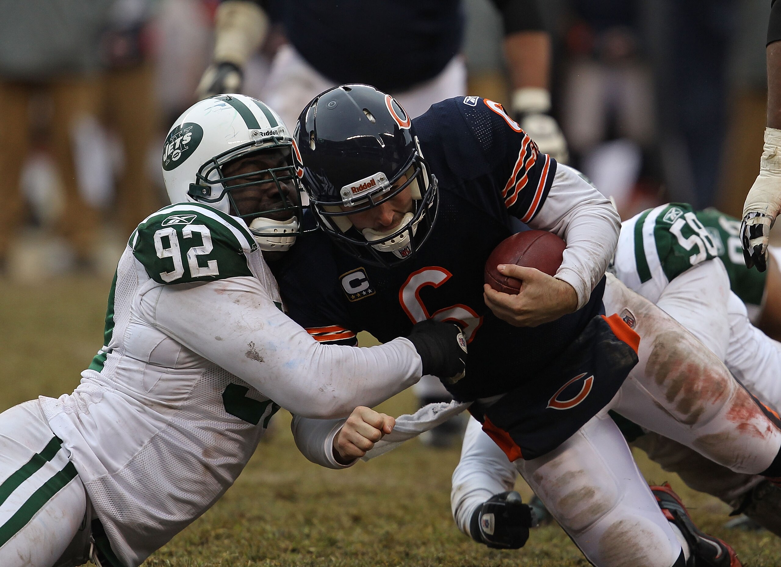 CHICAGO, IL - DECEMBER 26: Jay Cutler #6 of the Chicago Bears is sacked by Shaun Ellis #92 and Bryan Thomas #58 of the New York Jets at Soldier Field on December 26, 2010 in Chicago, Illinois. The Bears defeated the Jets 38-34. (Photo by Jonathan Daniel/G