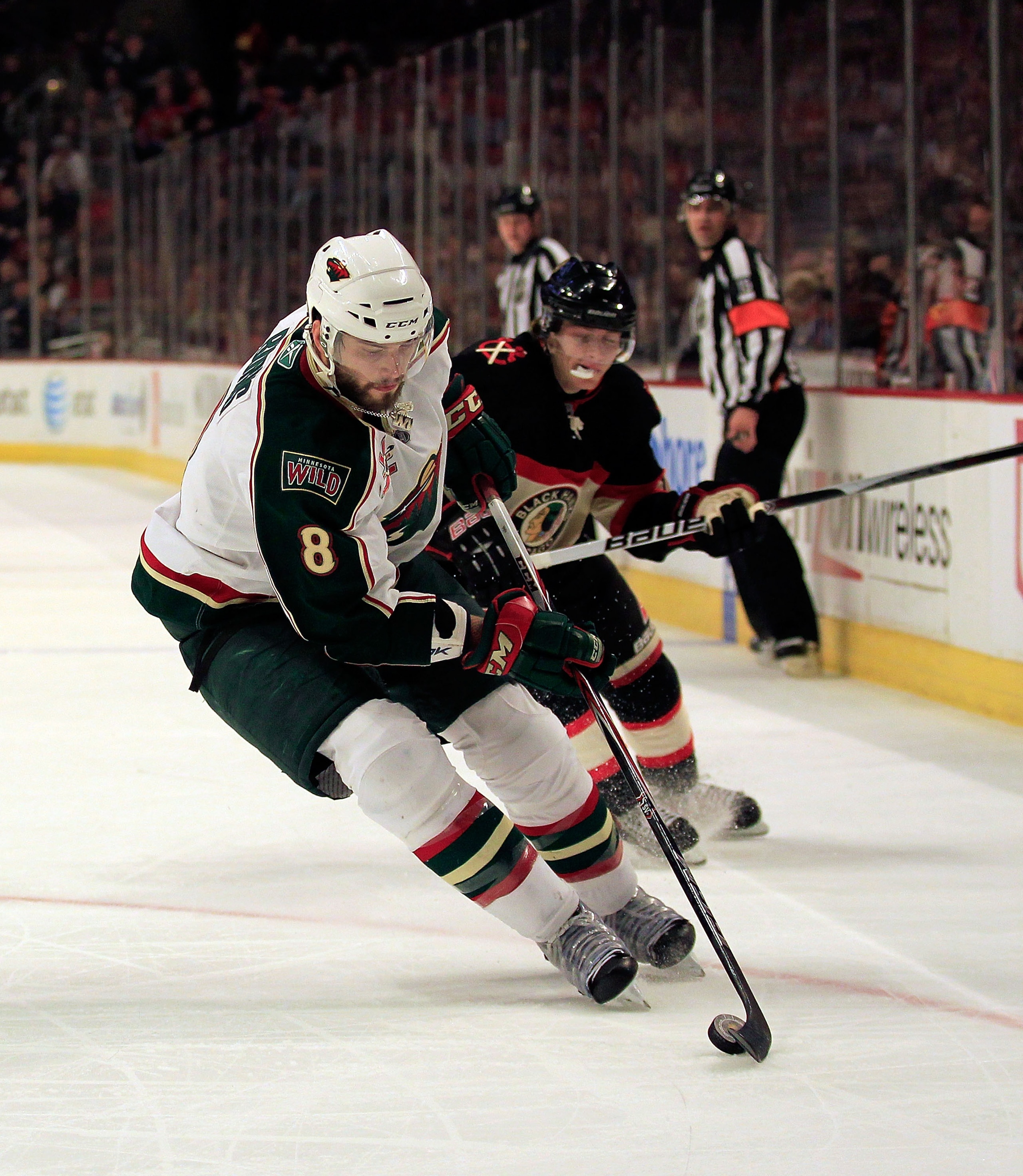 CHICAGO, IL - JANUARY 25: Brent Burns #8 of the Minnesota Wild controls the puck against Patrick Kane #88 of the Chicago Blackhawks at the United Center on January 25, 2011 in Chicago, Illinois. The Wild defeated the Blackhawks 4-2. (Photo by Jonathan Dan CHICAGO, IL - JANUARY 25: Brent Burns #8 of the Minnesota Wild controls the puck against Patrick Kane #88 of the Chicago Blackhawks at the United Center on January 25, 2011 in Chicago, Illinois. The Wild defeated the Blackhawks 4-2. (Photo by Jonathan Dan