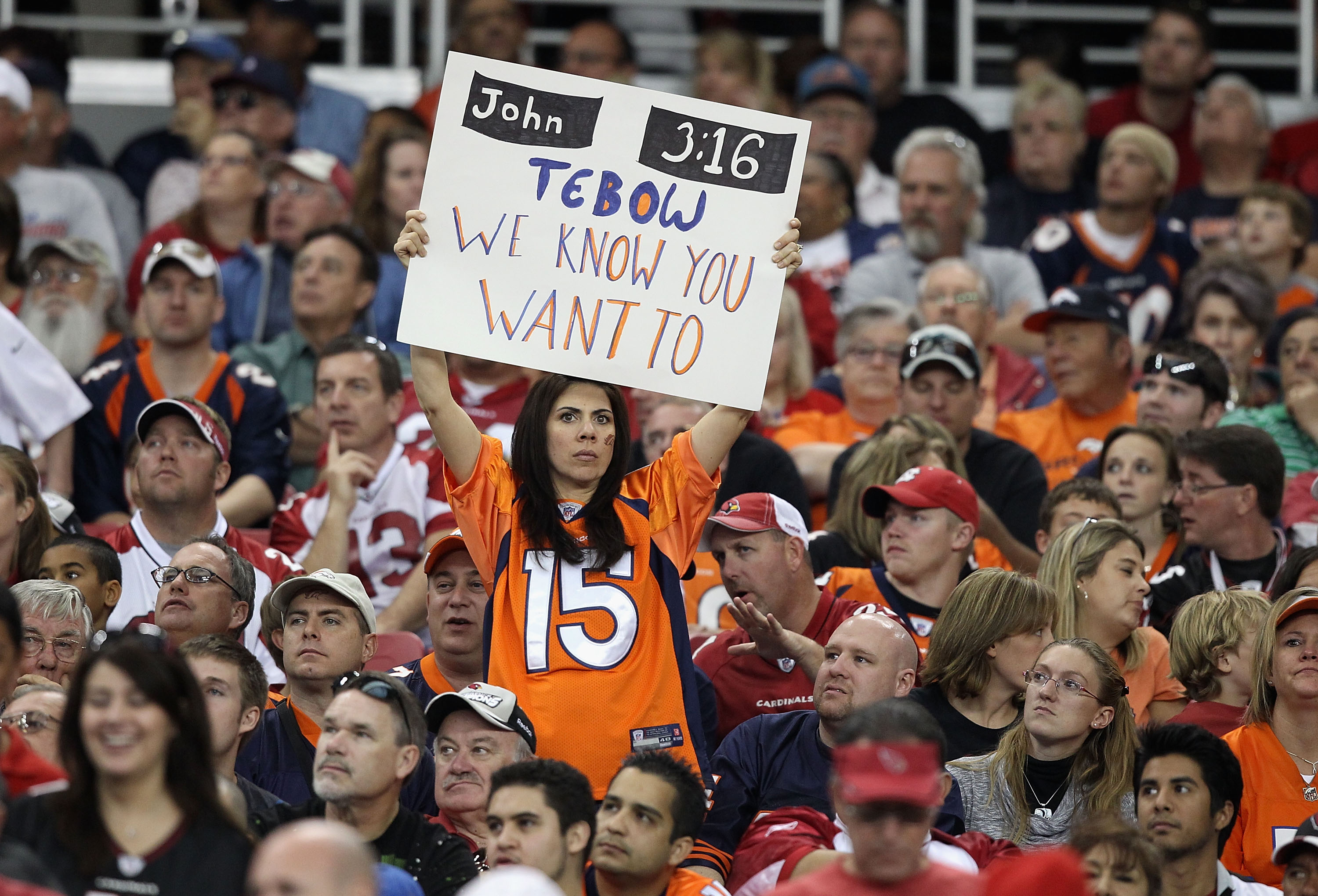 GLENDALE, AZ - DECEMBER 12:  A fan of the Denver Broncos holds up a sign for quarterback Tim Tebow #15 during the NFL game against the Arizona Cardinals at the University of Phoenix Stadium on December 12, 2010 in Glendale, Arizona.  The Cardinals defeate