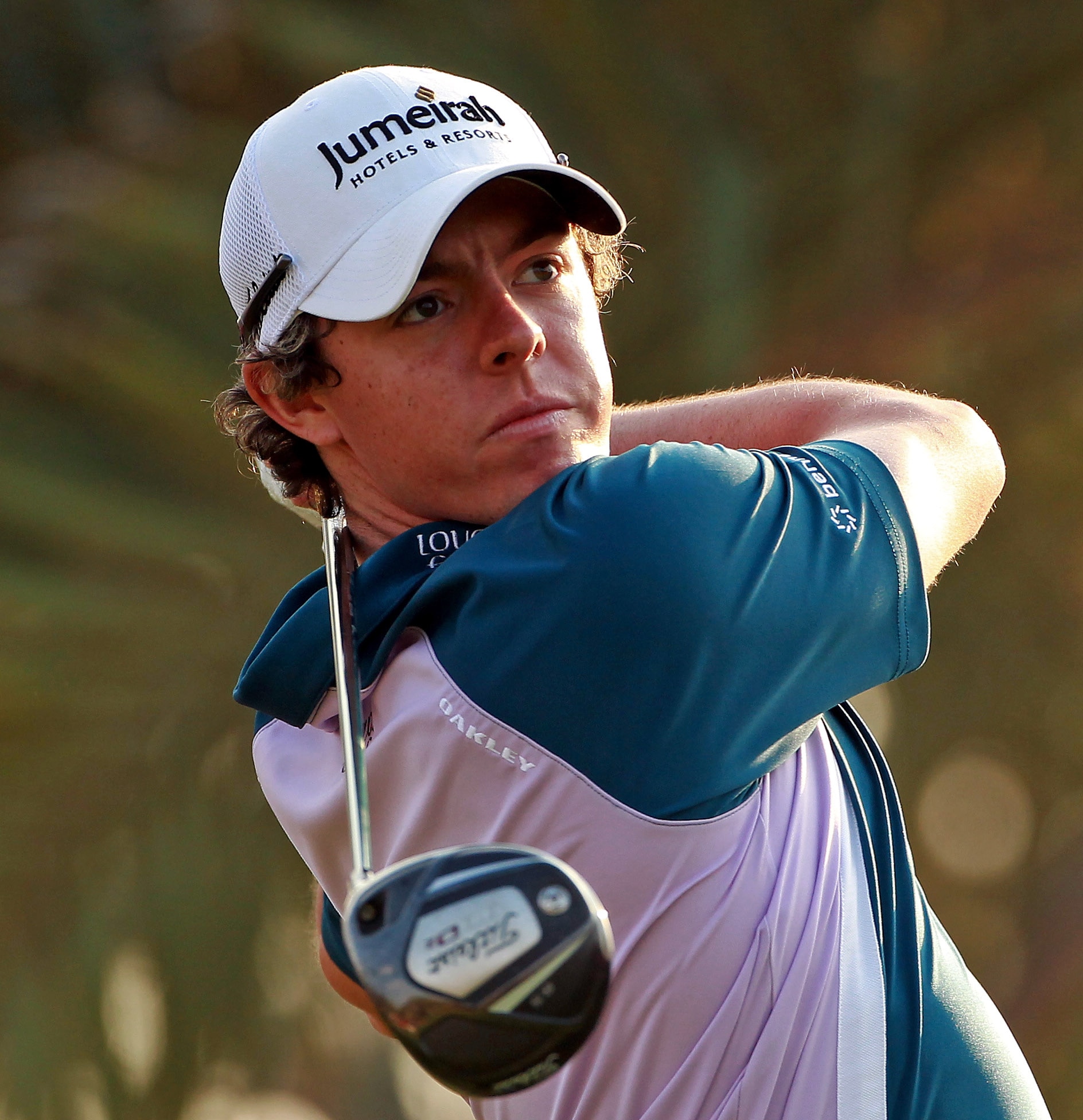 ABU DHABI, UNITED ARAB EMIRATES - JANUARY 23: Rory McIlroy of Northern Ireland in action during the final round of The Abu Dhabi HSBC Golf Championship at Abu Dhabi Golf Club on January 23, 2011 in Abu Dhabi, United Arab Emirates. (Photo by Andrew Redin