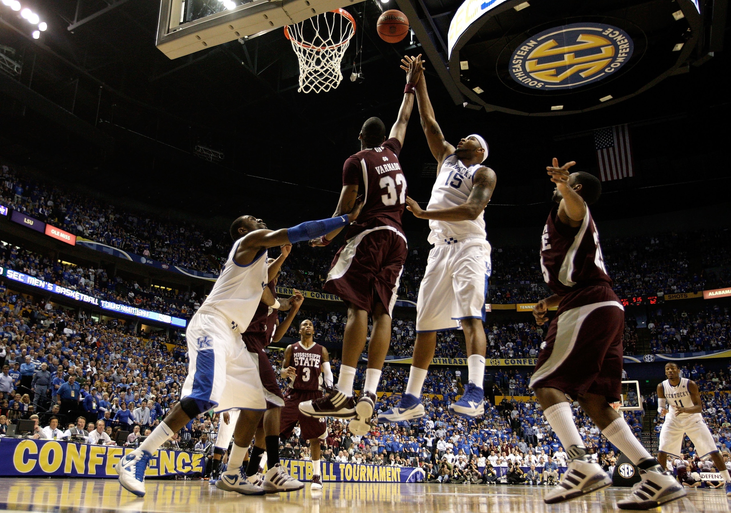 NASHVILLE, TN - MARCH 14:  DeMarcus Cousins #15 of the Kentucky Wildcats attempts a shot against Jarvis Varnado #32 of the Mississippi State Bulldogs during the final of the SEC Men's Basketball Tournament at the Bridgestone Arena on March 14, 2010 in Nas