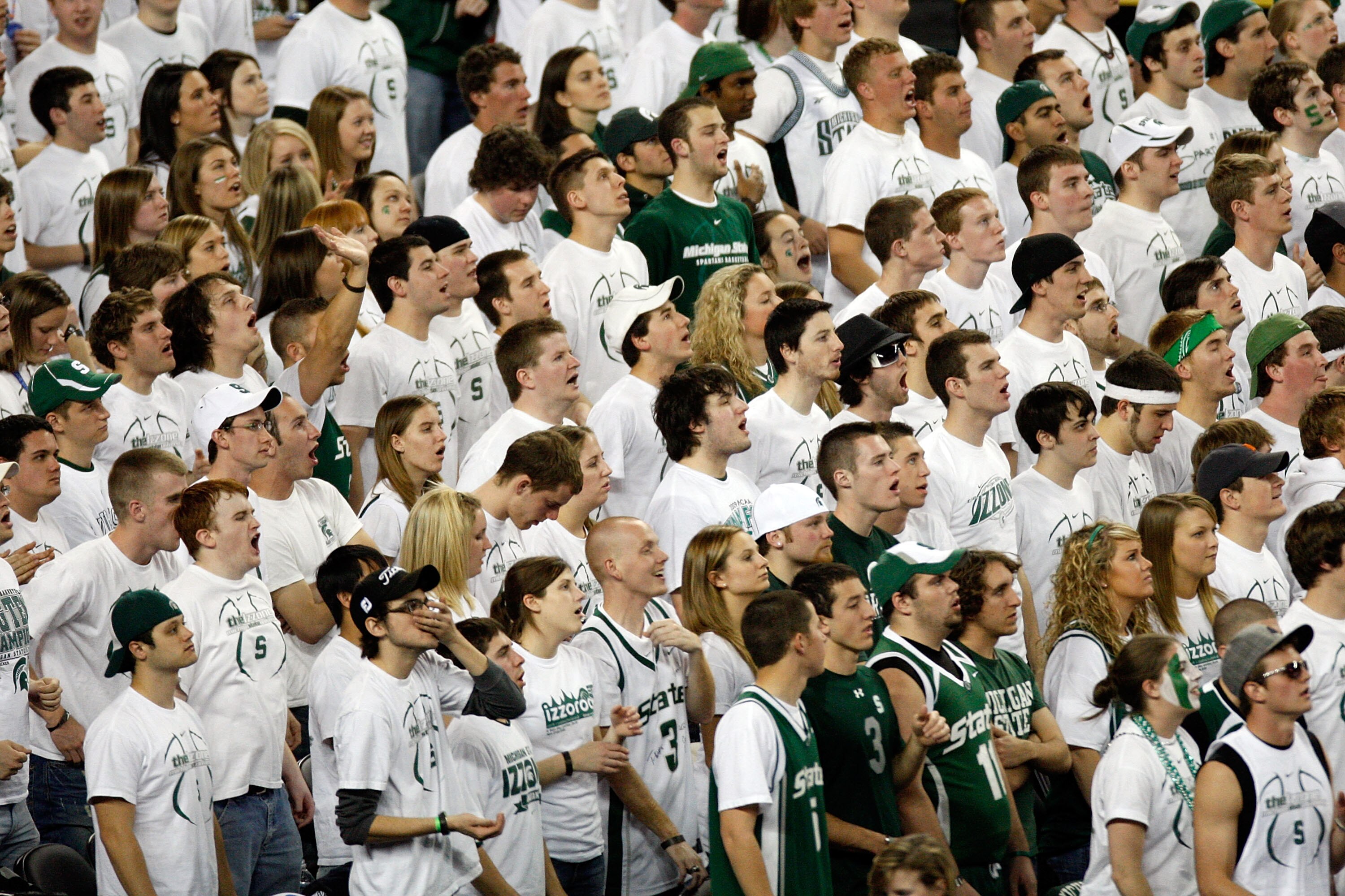 DETROIT - APRIL 04:  Michigan State Spartans fans cheer on their team in the second half while taking on the Connecticut Huskies during the National Semifinal game of the NCAA Division I Men's Basketball Championship at Ford Field on April 4, 2009 in Detr