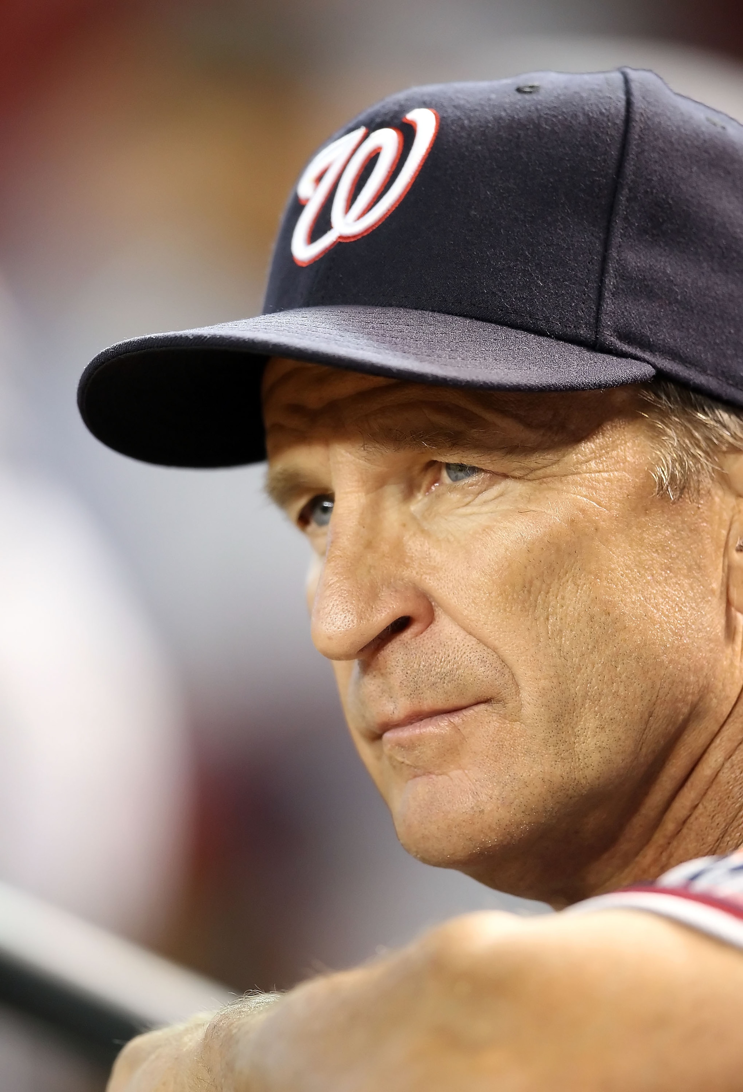 PHOENIX - AUGUST 04:  Manager Jim Riggleman of the Washington Nationals in the dugout during the Major League Baseball game against the Arizona Diamondbacks at Chase Field on August 4, 2010 in Phoenix, Arizona.  The Nationals defeated the Diamondbacks 7-2