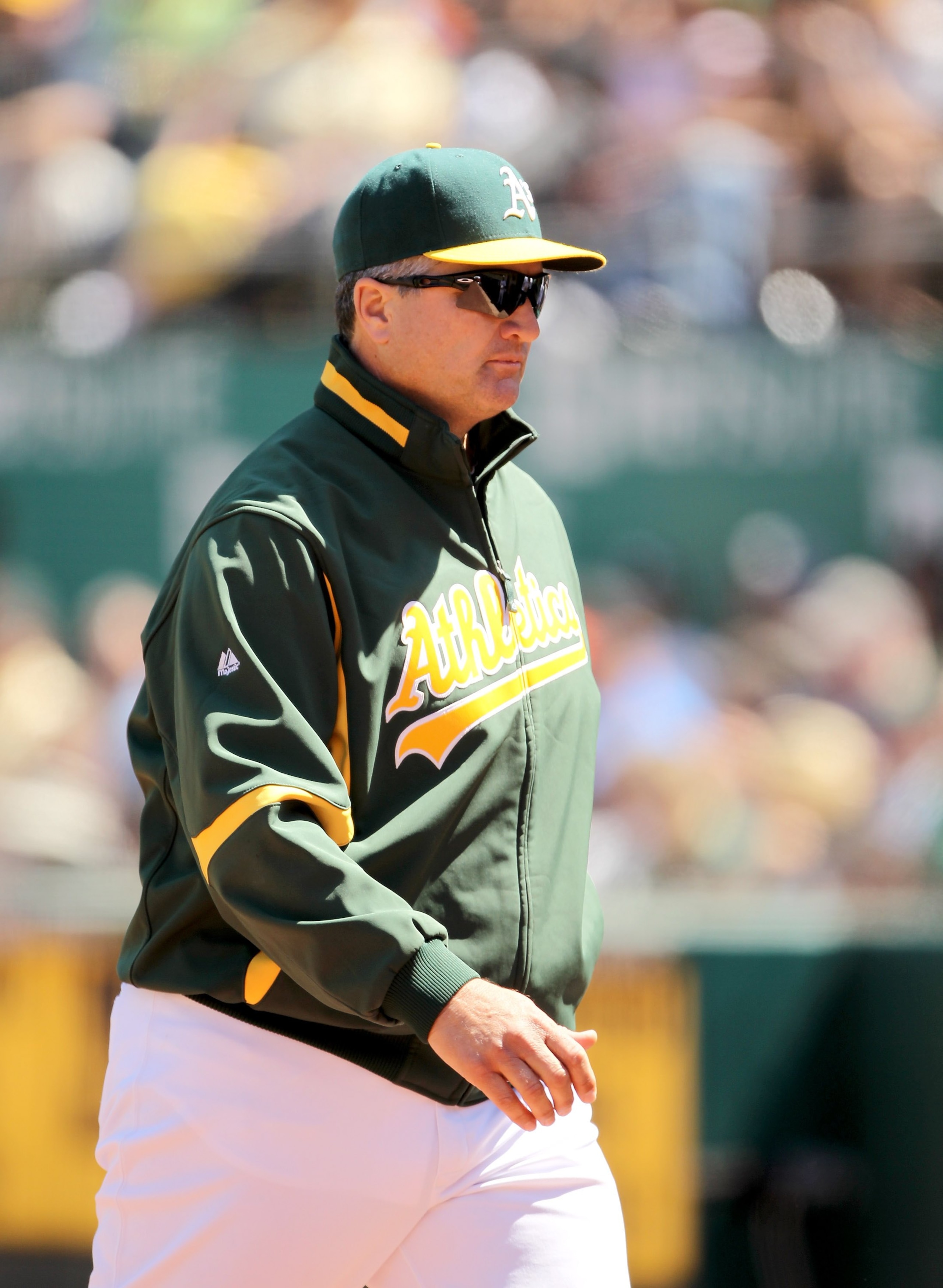 OAKLAND, CA - MAY 23:  Manager Bob Geren of the Oakland Athletics walks back to the dugout during their game against the San Francisco Giants at the Oakland-Alameda County Coliseum on May 23, 2010 in Oakland, California.  (Photo by Ezra Shaw/Getty Images)